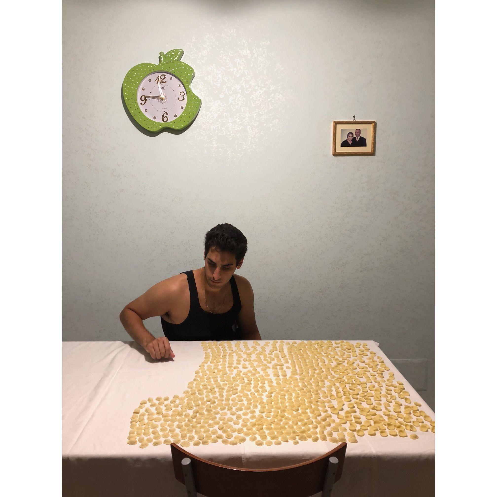 Michael sorting through Orecchiette in Montescaglioso, Italy