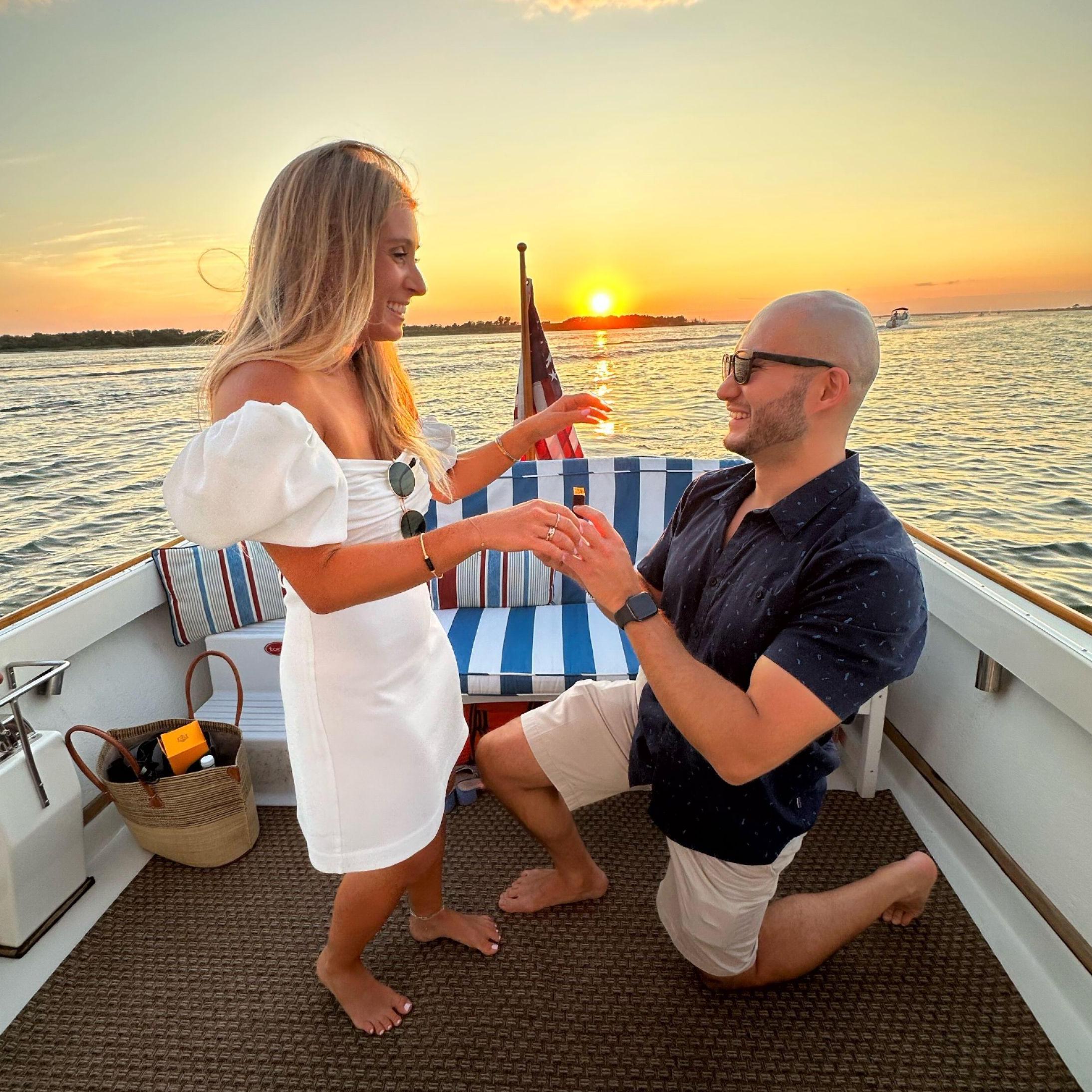 July 21, 2023: Sanzhar proposed at sunset on a boat in LBI!