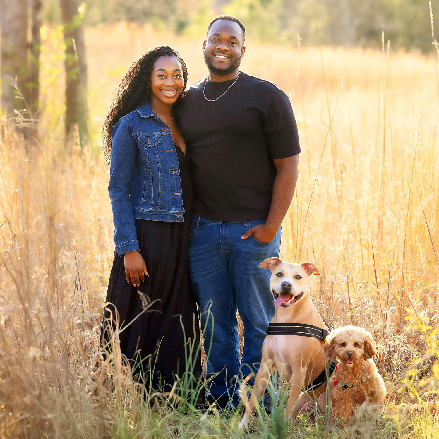 Picture of us with our beautiful dogs, Clay and Cash