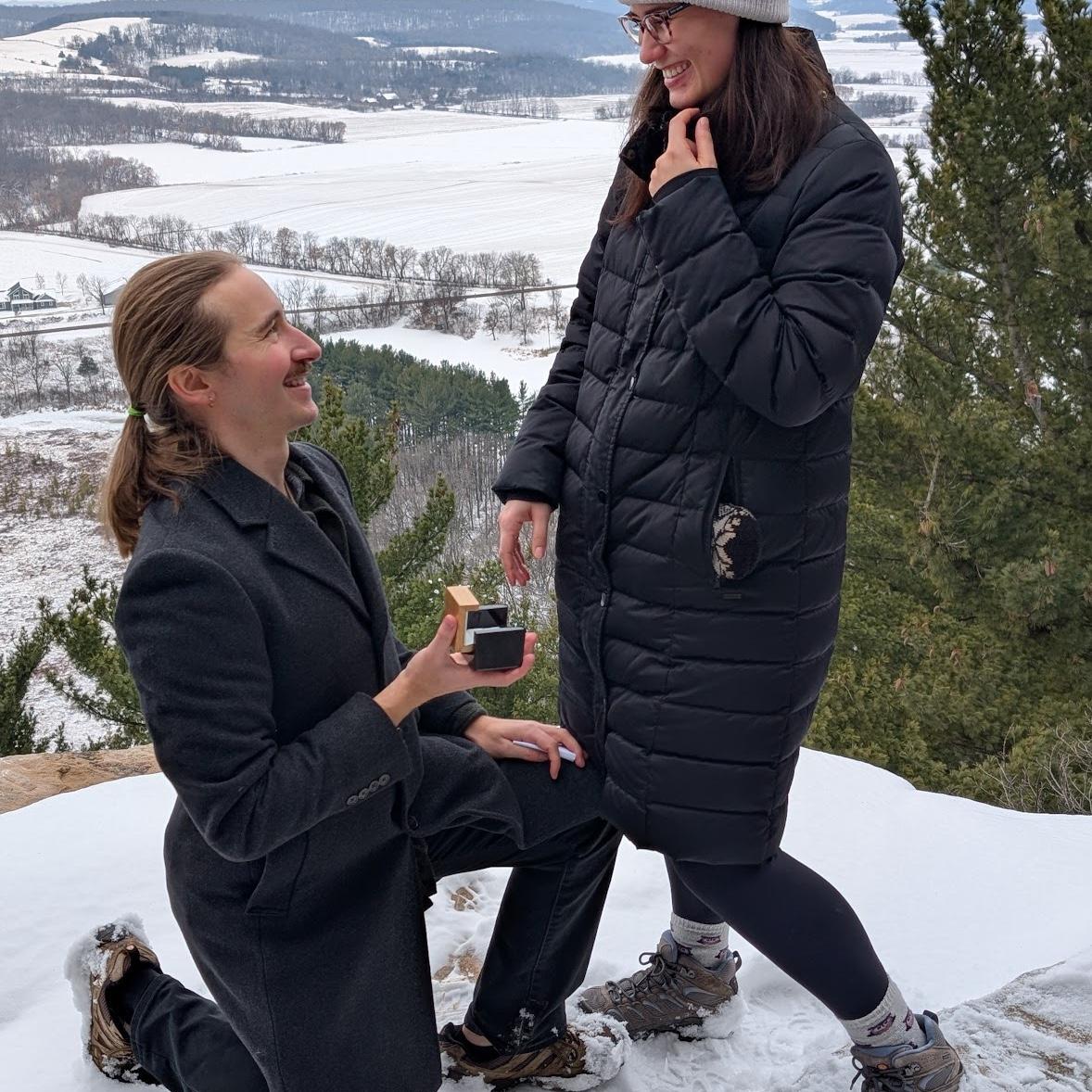 Karsten re-proposing at one of the many favorite hiking spots in WI! Birdy saw it coming, he was acting too suspicious! But that doesn't mean she wasn't just as excited :)