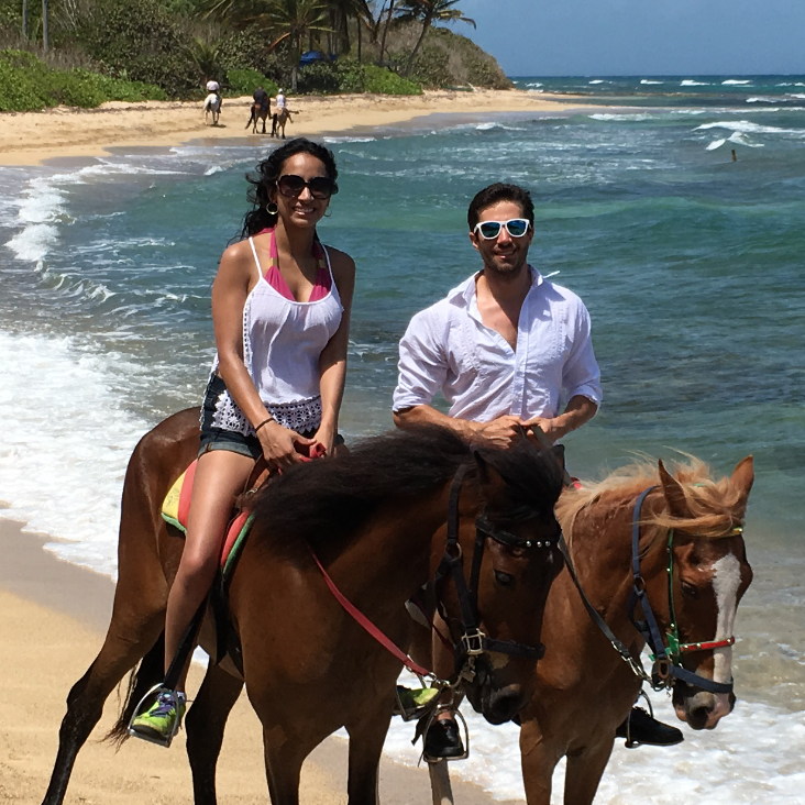 Riding horses on Vieques, an island off the coast of Puerto Rico...before Rhea galloped off down the beach while Luke trotted along slowly behind her trying desperately to not fall off