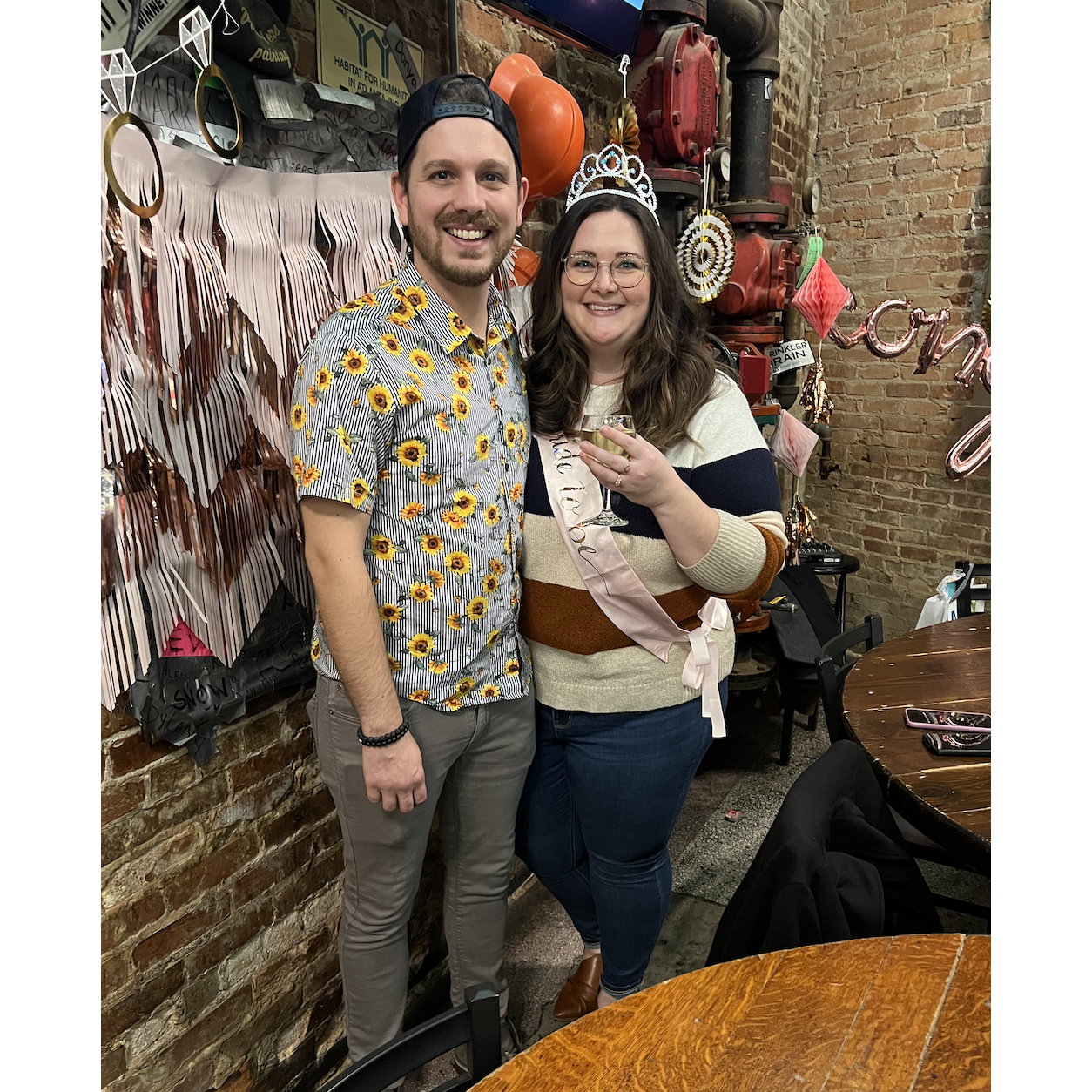 At our surprise engagement party at Manuel's Tavern after the engagement!