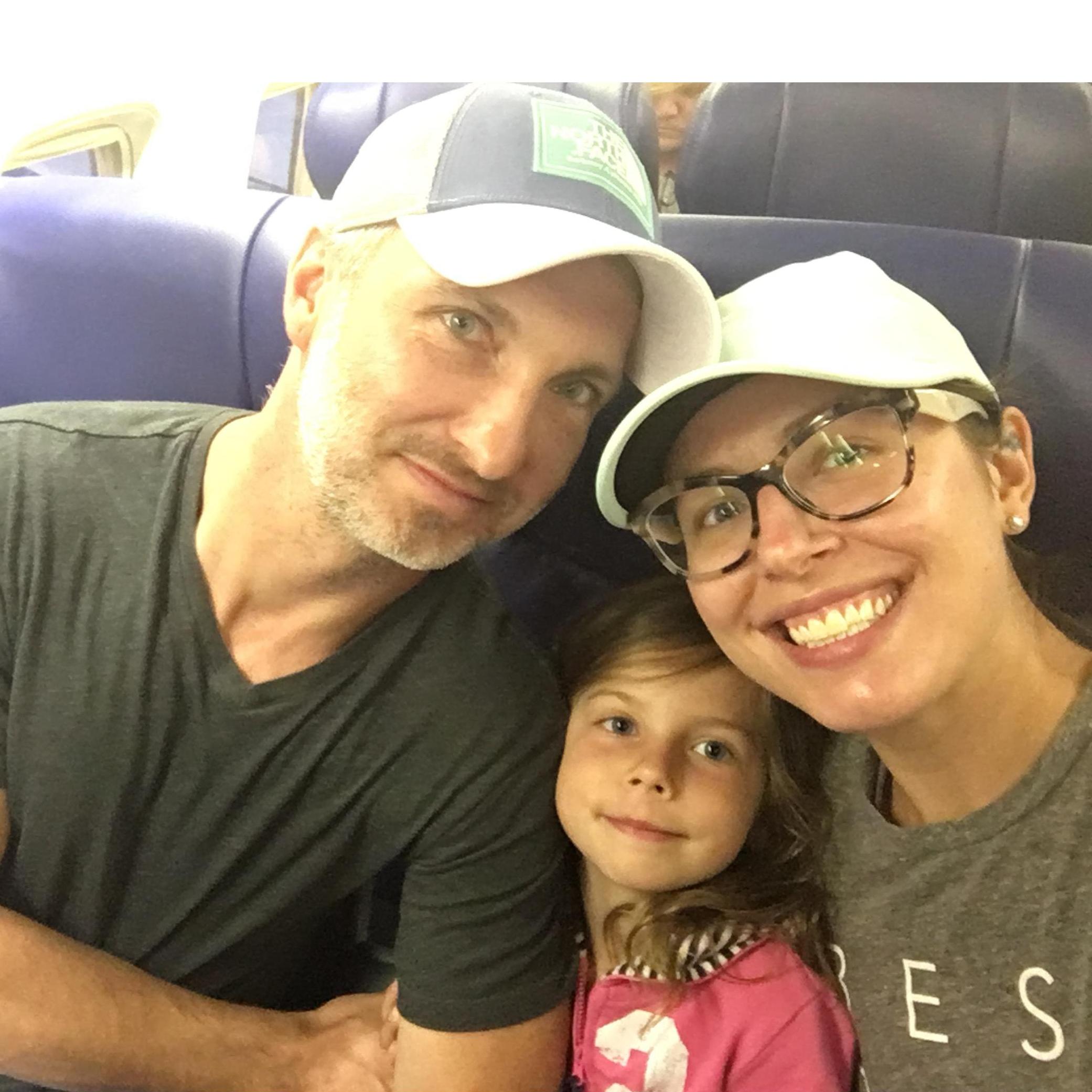 On our way to Florida (shortly thereafter this photo was taken, Michael showed London the ring in his backpack when he thought Ali wasn't looking!)