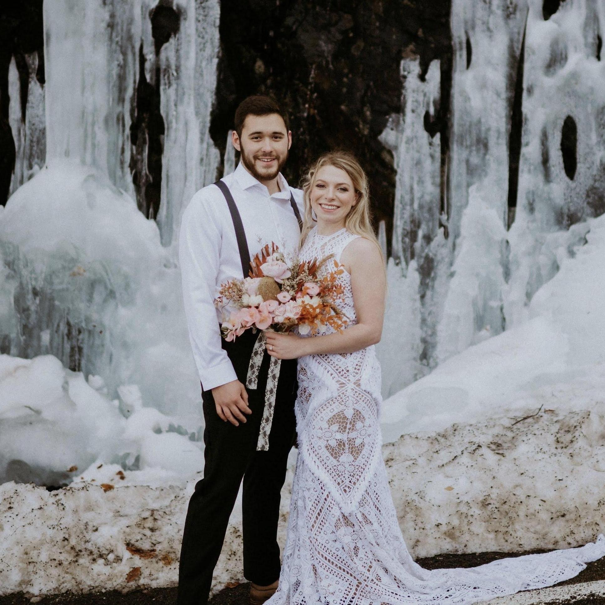 Bridal portrait from photoshoot on proposal day posing in front of ice on Roan Mountain. (February 12, 2021)