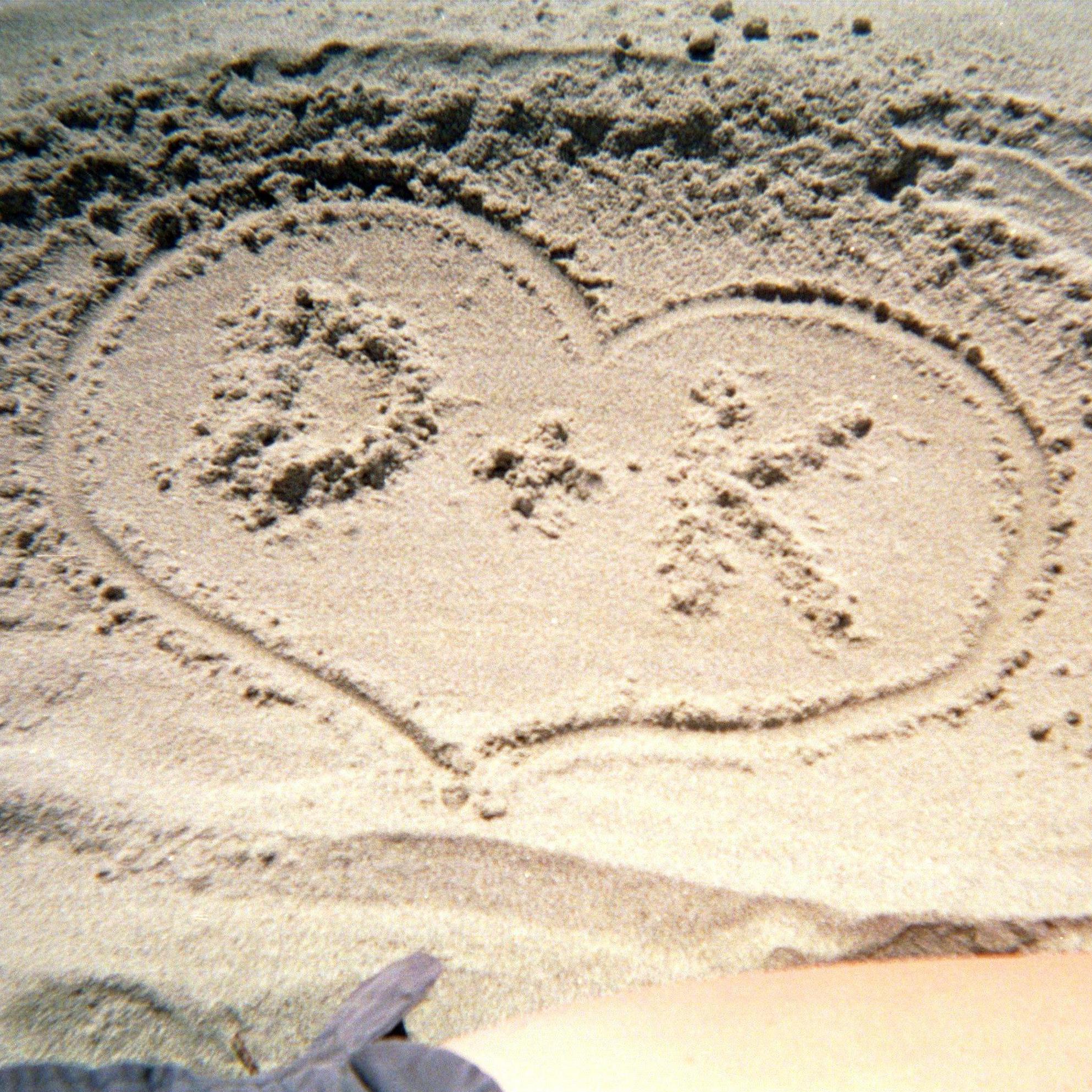 drawn in the sand at Cannon Beach, OR