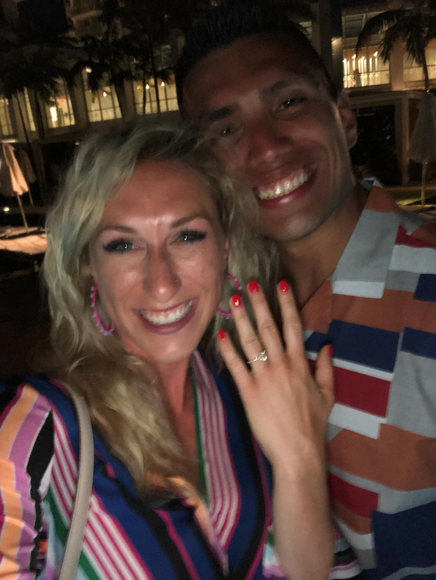 This picture is blurry because it was right after Luis proposed and Jillian was shaking of excitement!