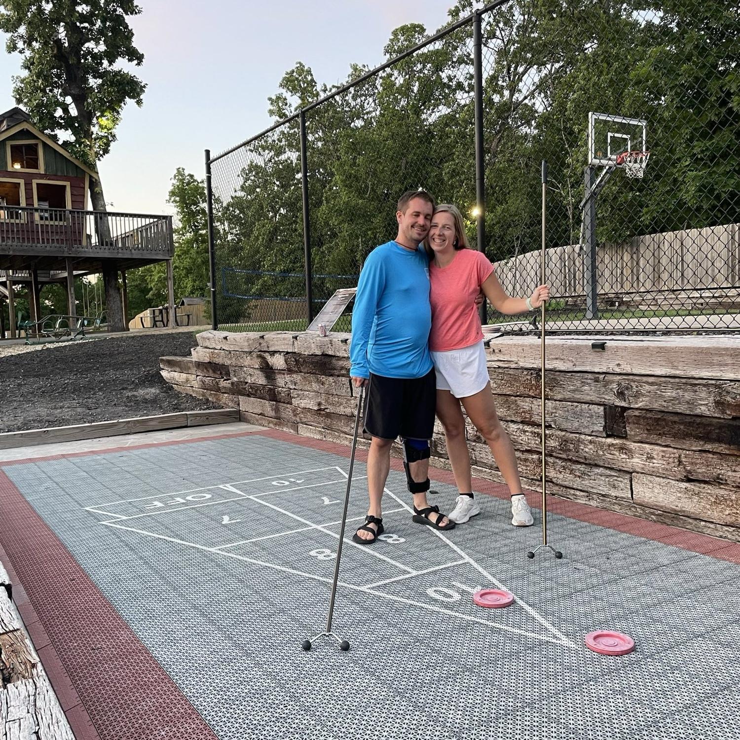 Payton beating Matthew in shuffle board!