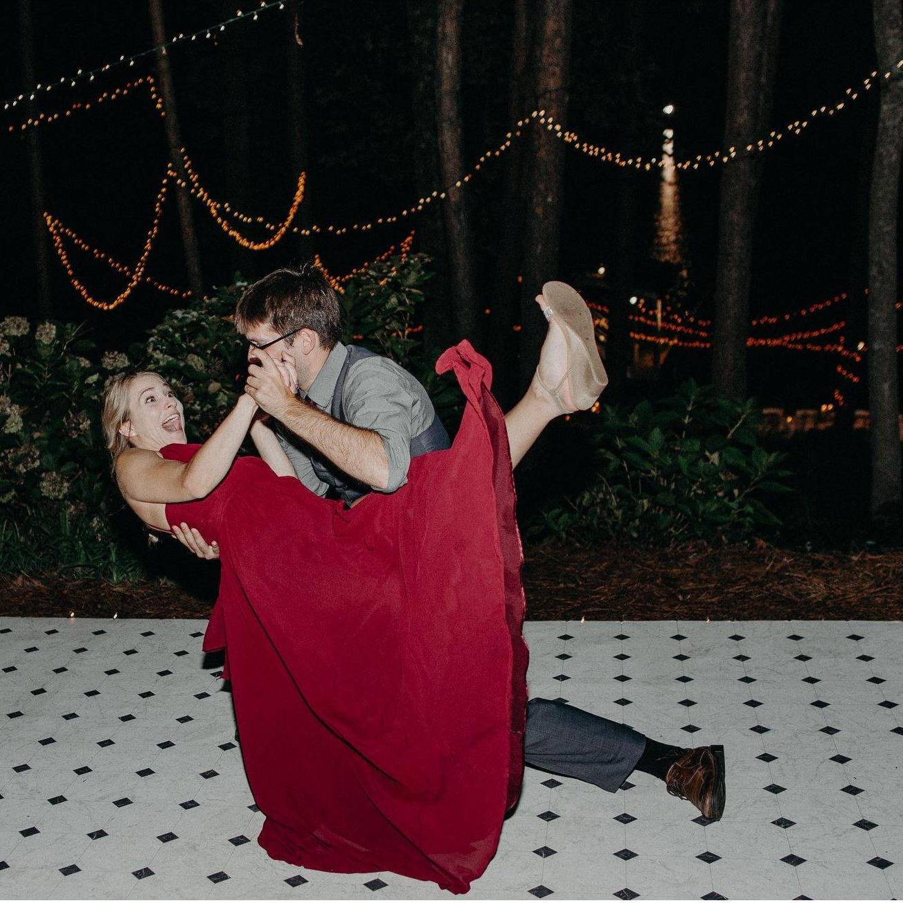 Amanda loves surprise dips! Dancing at Chris and Andrea's wedding :)