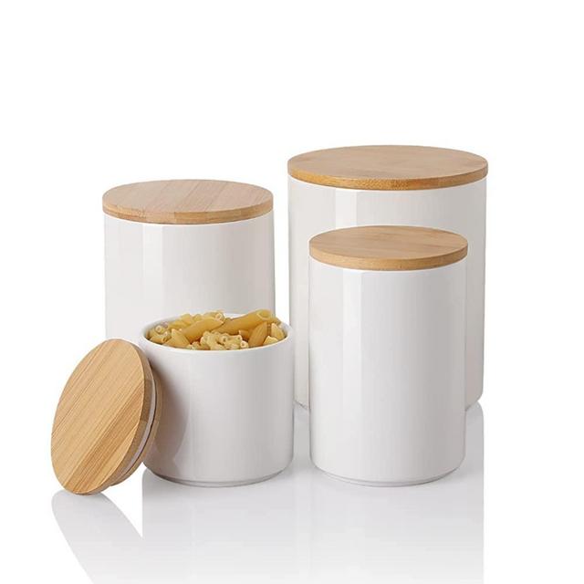 Sweejar Ceramic Canisters, Food Storage Jar Set with Airtight Seal Wooden Lid, Stackable Containers for Kitchen Counter, Ground Coffee, Flour, Sugar, Salt, Cookie, Dog Treats, Herbs, Candy and More - Set of 4 (White)