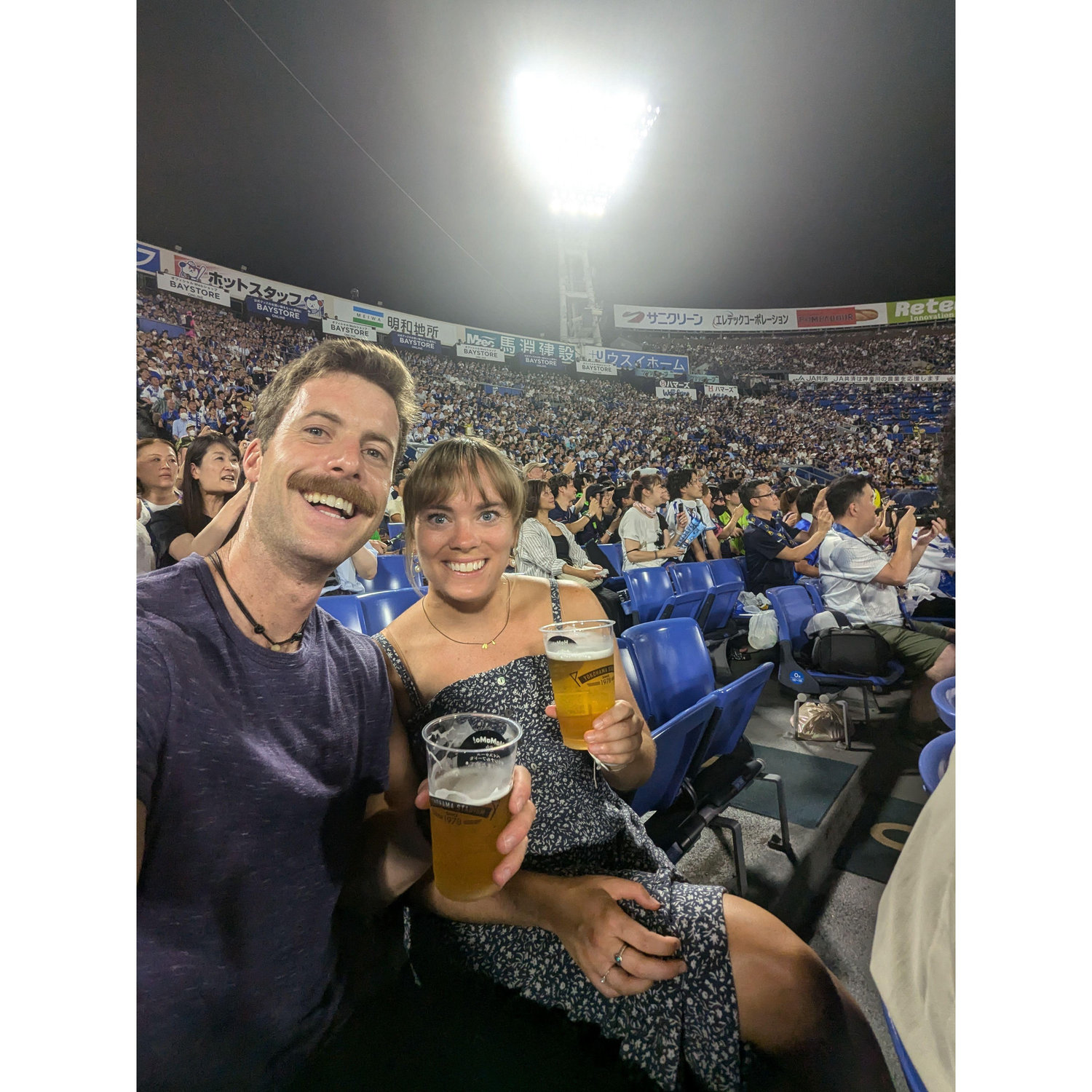 Best part of baseball in Japan: "beer girls" carry kegs to bring fresh beer to you!