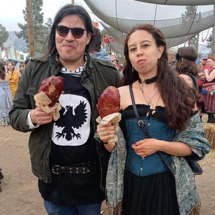 Eating turkey legs at the Renaissance Faire. Gilroy, 2023