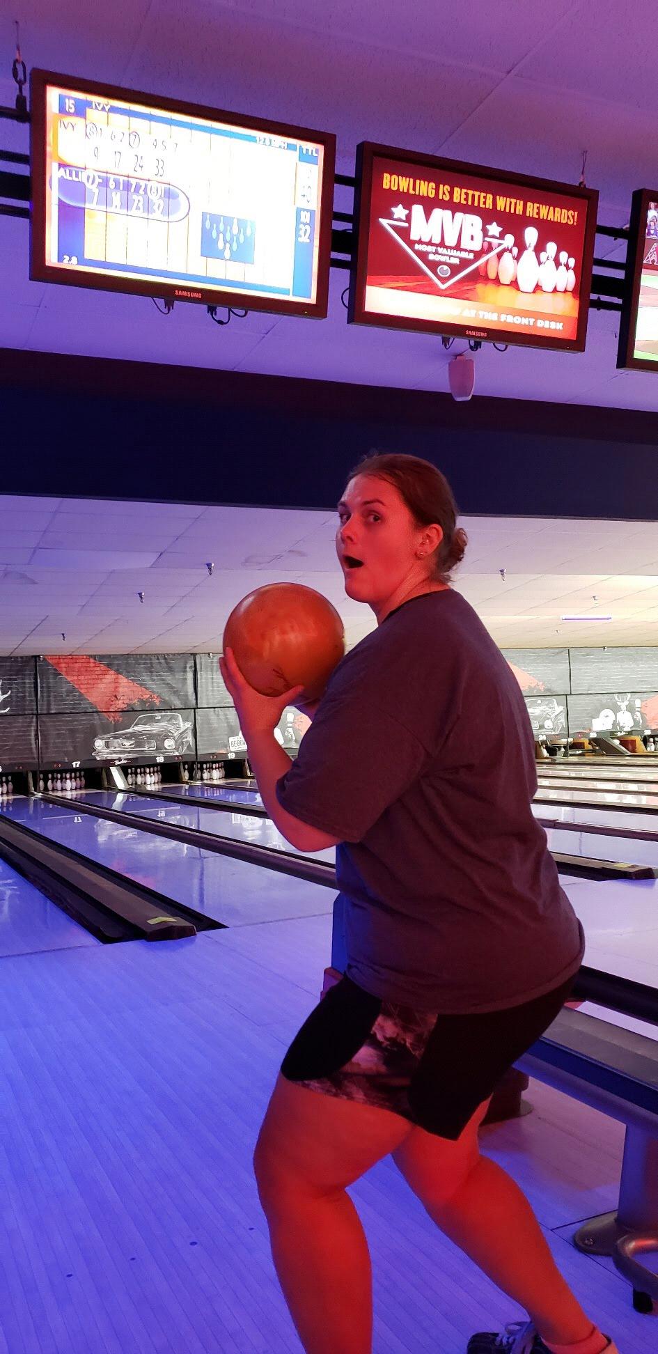 One of us likes bowling . . . the other is having to learn . . .