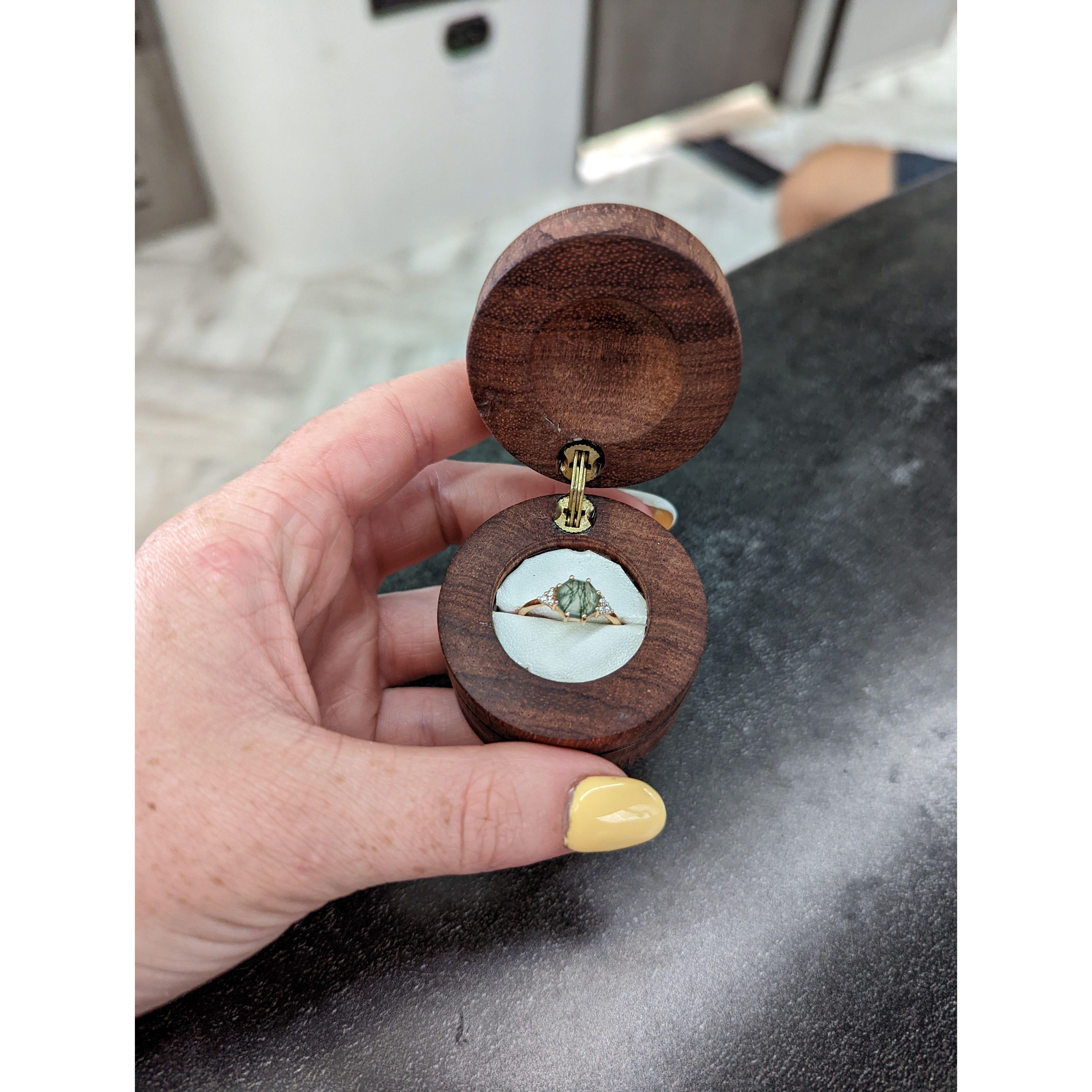 The ring inside of the ring box Adam made himself on his lathe