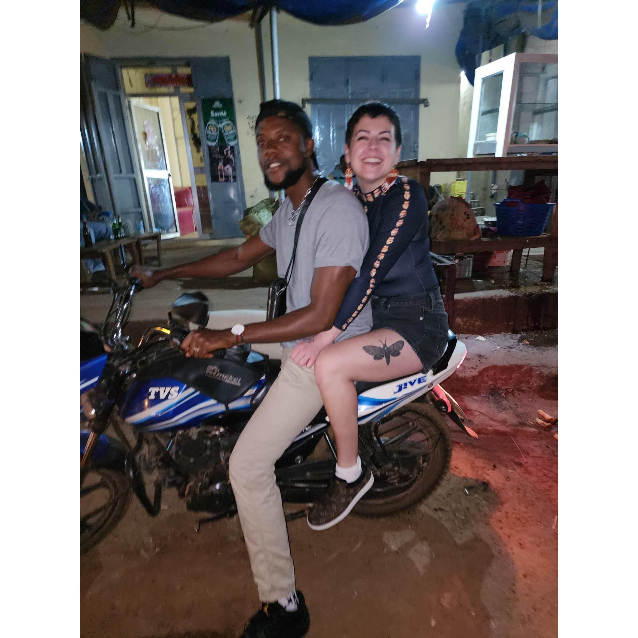 Our first photo together, taken the second night we met. Jean took Auk on a motorcycle ride—just one of our many firsts. Conakry, December 2022.