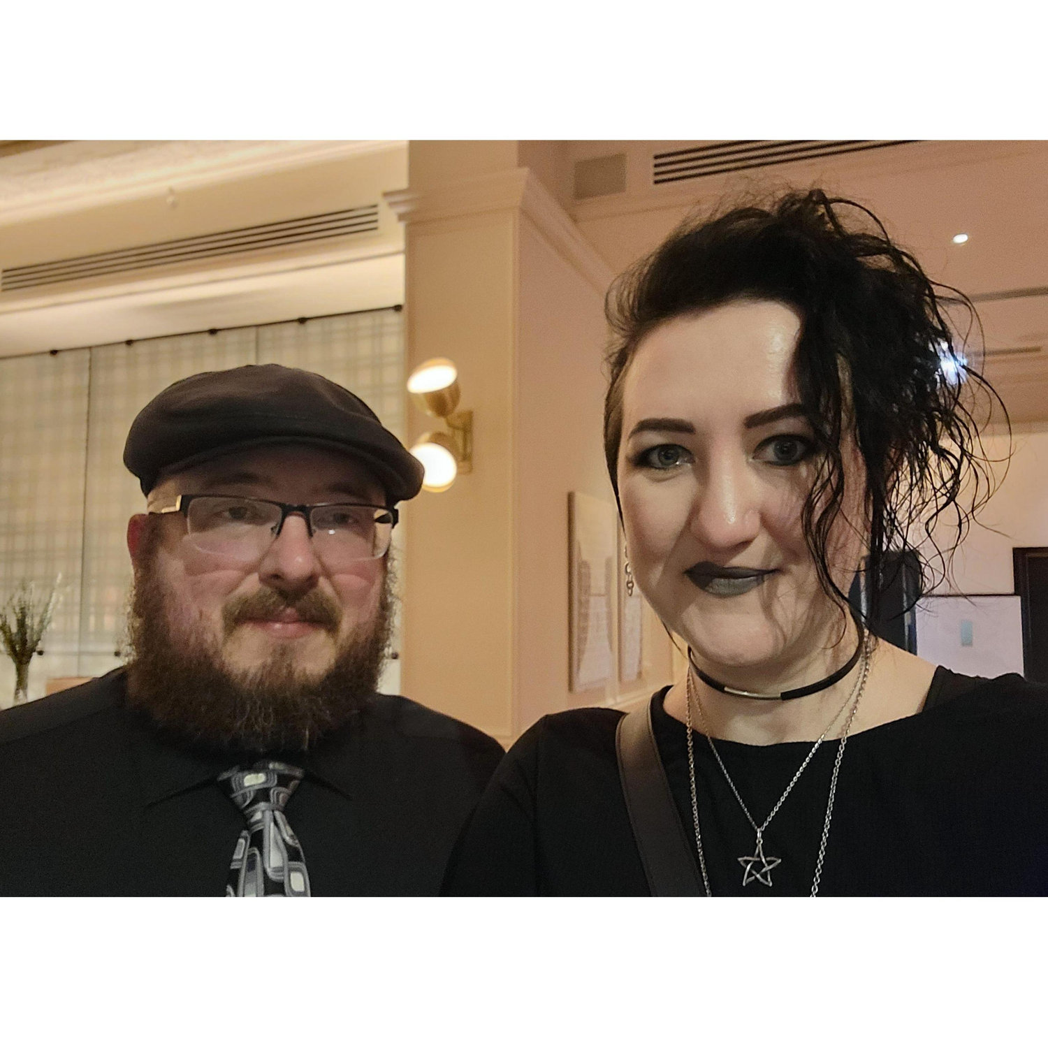 Pre Valentine's Day Dinner Selfie in the hotel lobby while they waited for their ride. Josh has learned to tolerate Lauren taking photos...
