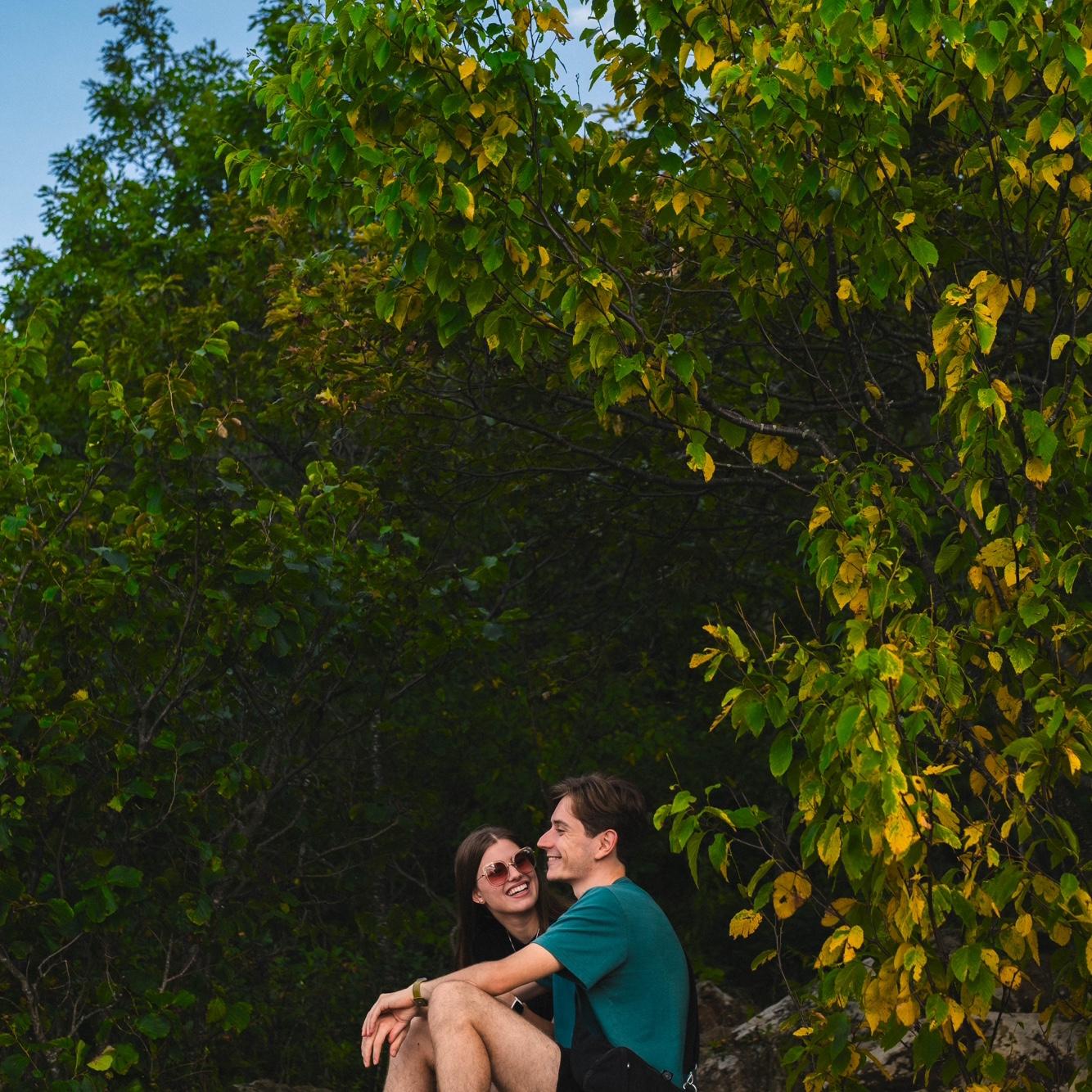 Josh proposed to Reagan in the Shenandoah National Park, on the top of Compton Peak. Here we are chatting, minutes after she said "Yes!"