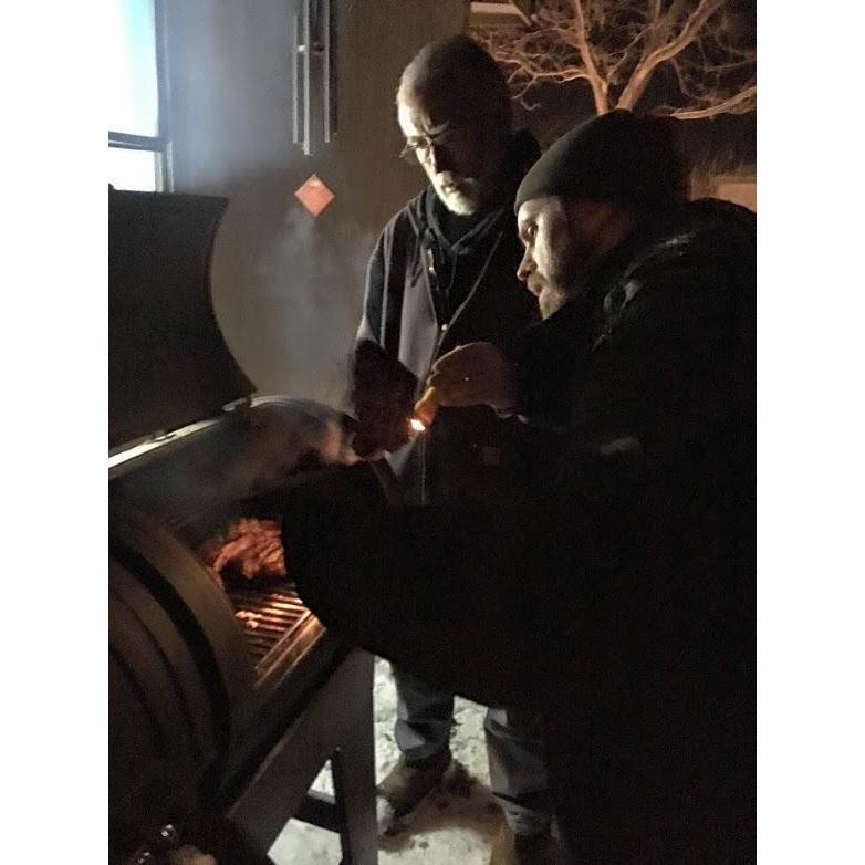 Grilling in the snow (Believe it or not, this was not hazing. He wanted to do it!)