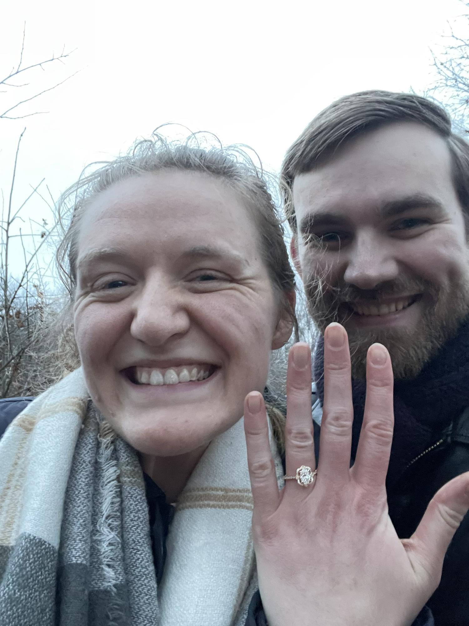 "Oh we should get a photo of this before we leave!" Our first photo as an engaged couple.