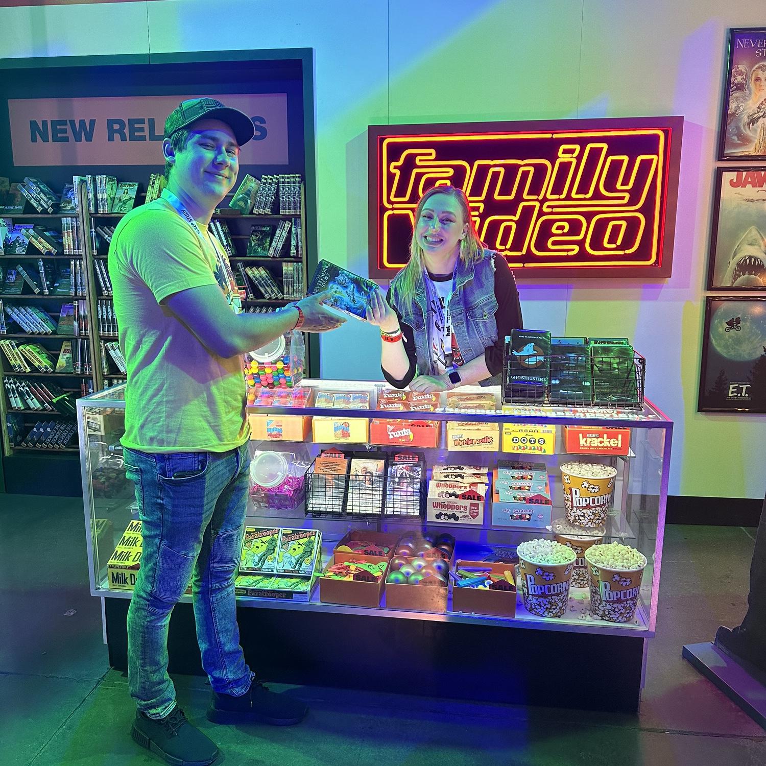Codi is the employee of the month at the Family Video located in the Stranger Things pop up event.