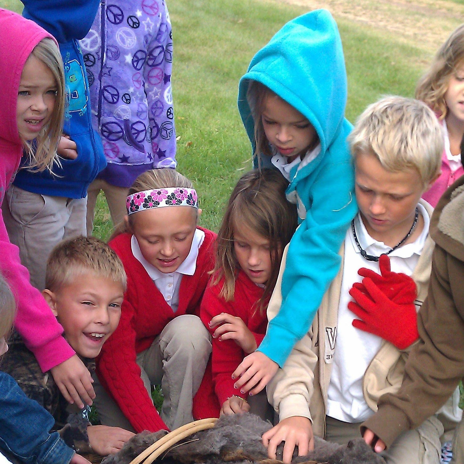 Yup, we go all the back to first grade! Catherine is in the blue sweatshirt and Max with his Phiten necklace.