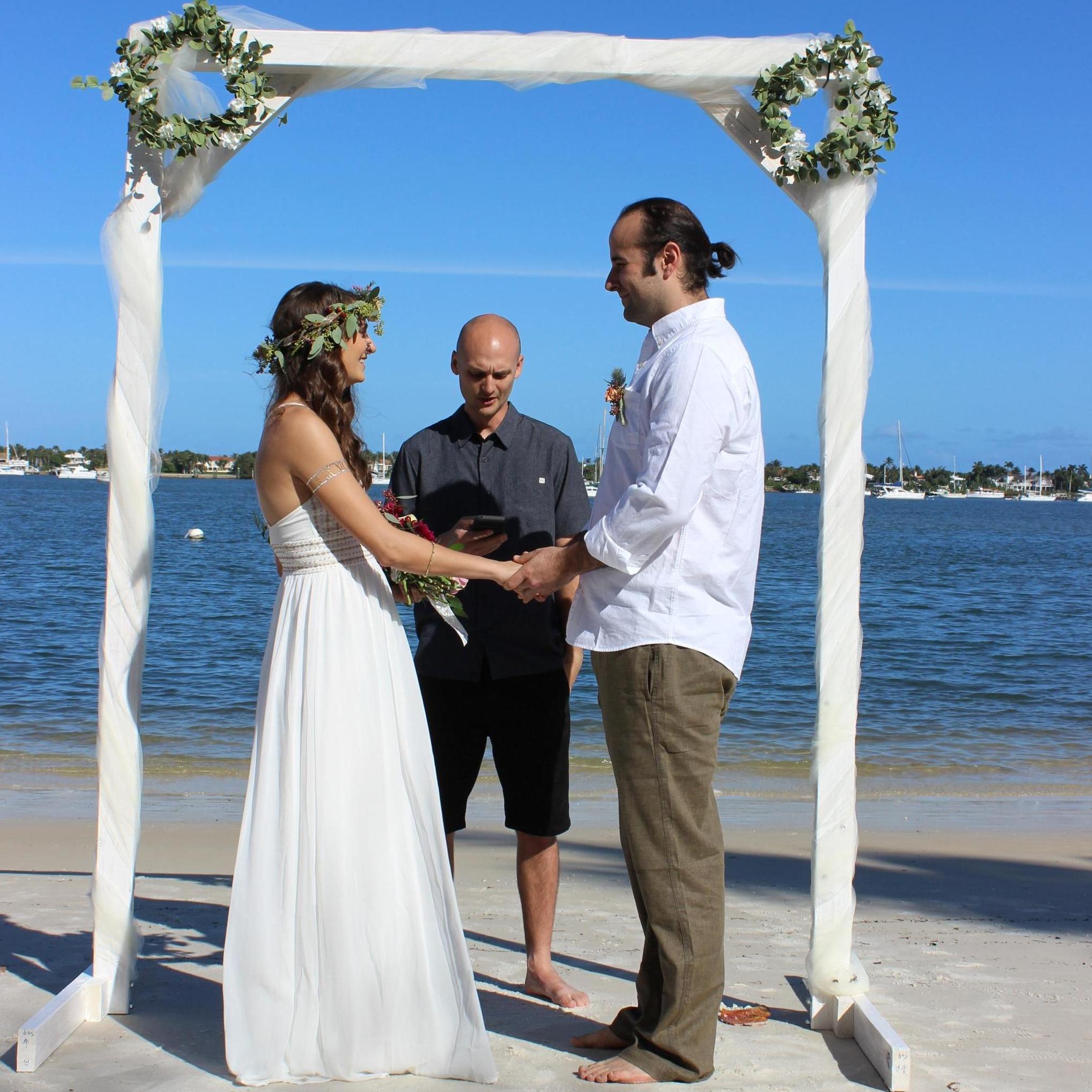 Andrew, Jac's favorite (and only brother), officiated their ceremony. With toes in the sand, they said "I do".. again. :)