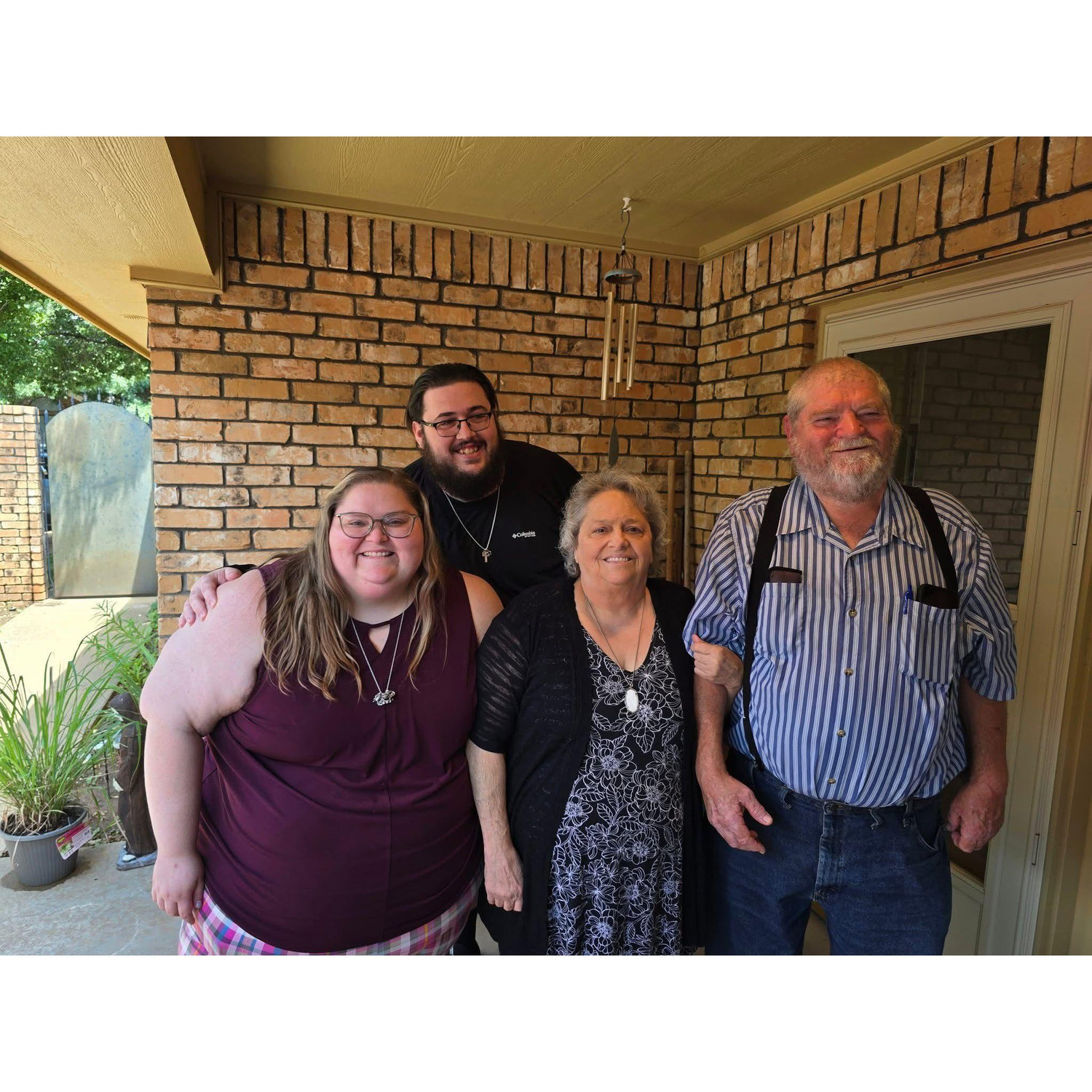 Manny & Clydos with her parents at her Dad’s family reunion.