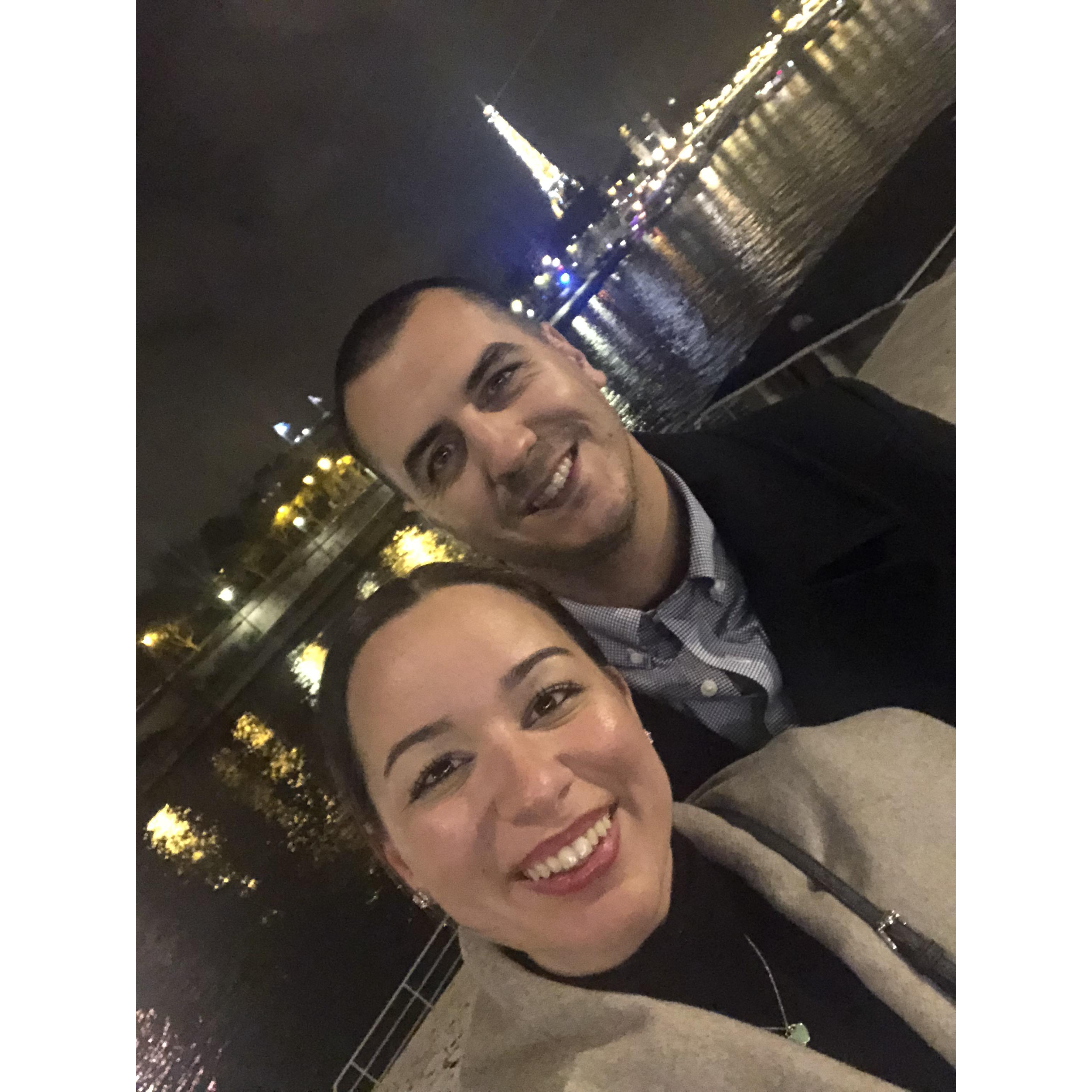 The night before they got engaged, they ate burgers and walked along the Seine under a full moon!