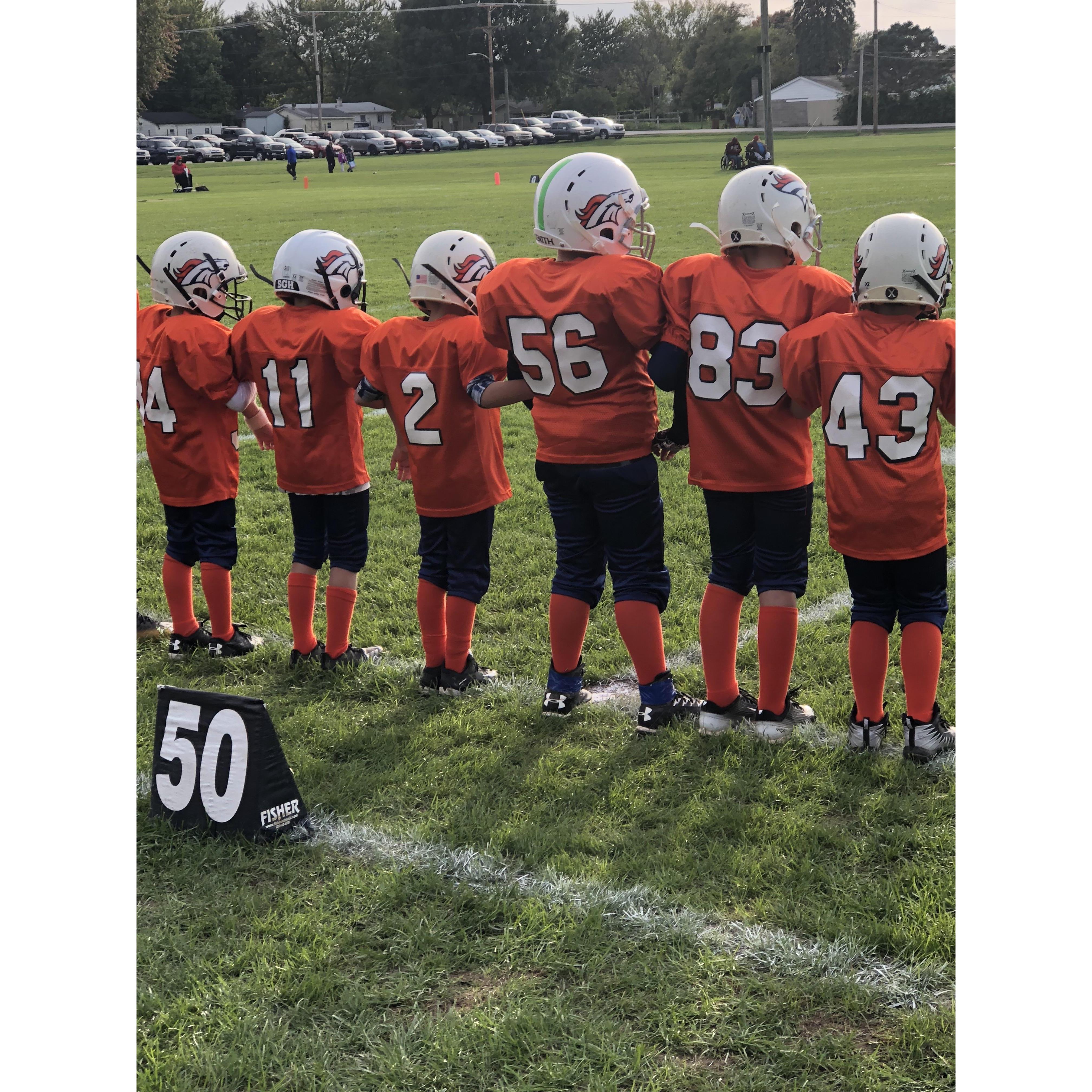 Jackson and Zach play football and love it!