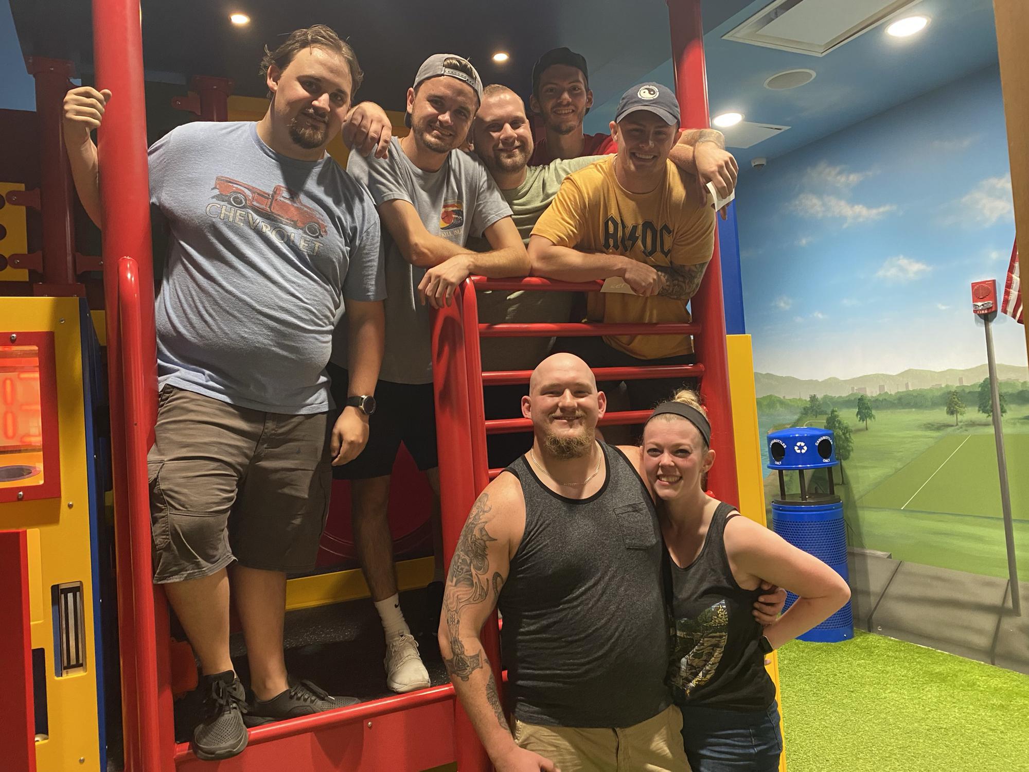 We had just beat Playground and gotten engaged, but still needed the group photo op!