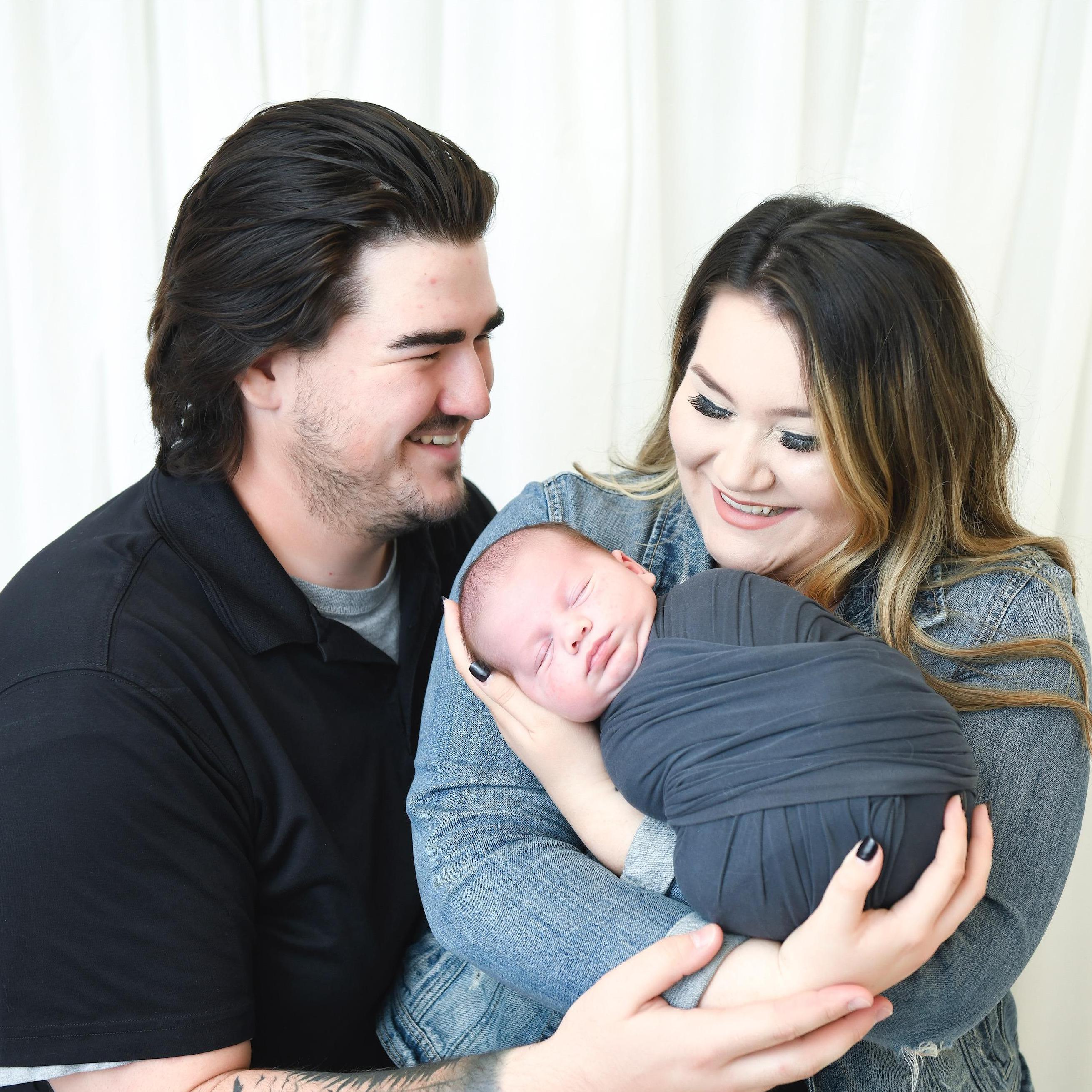 We were laughing because our son was 100% pooping while taking this photo.