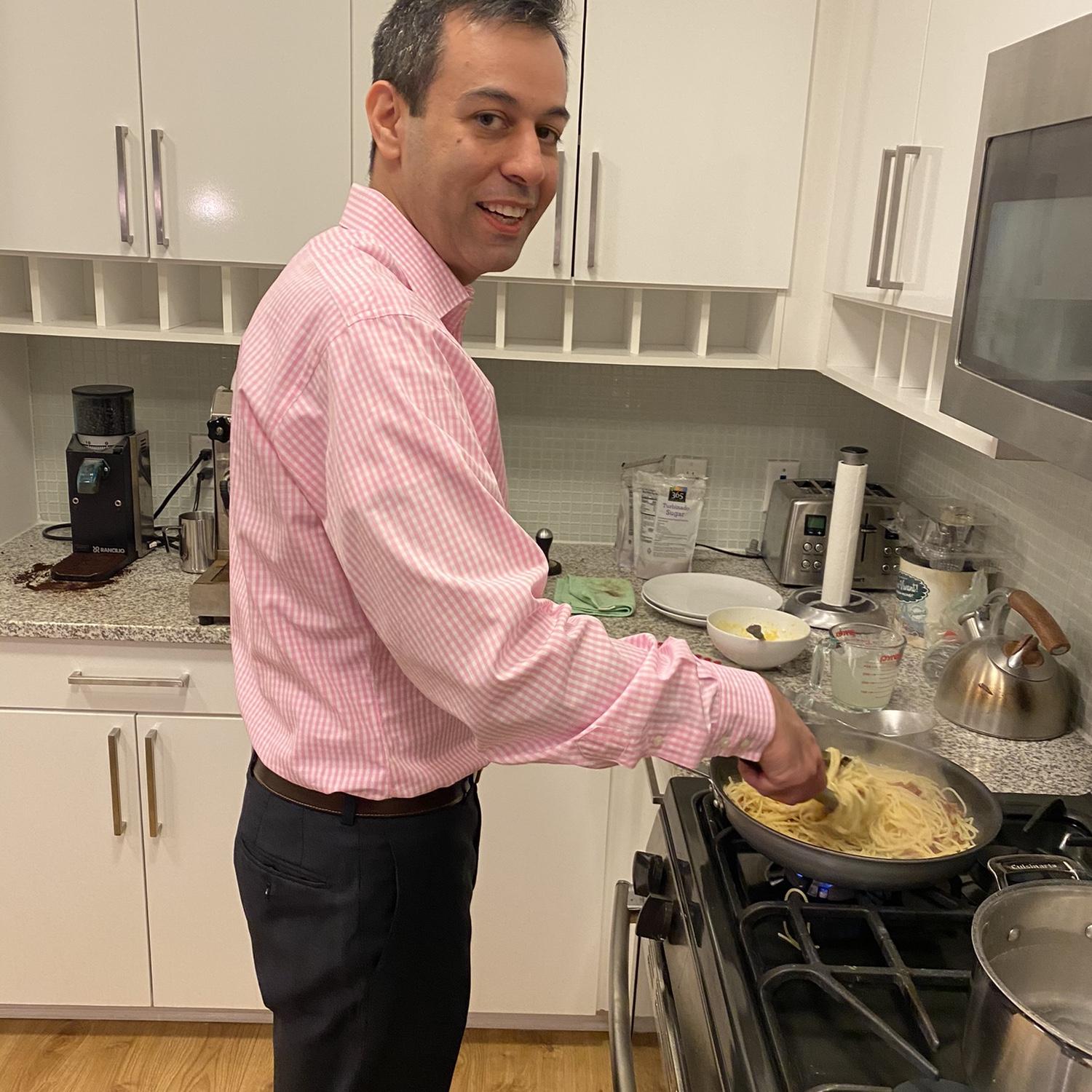 During the pandemic, it was hard to go on dates. Sometimes we’d get dressed up for no reason and stay home.
Here, Jason is making gluten free spaghetti carbonara in cocktail attire!
