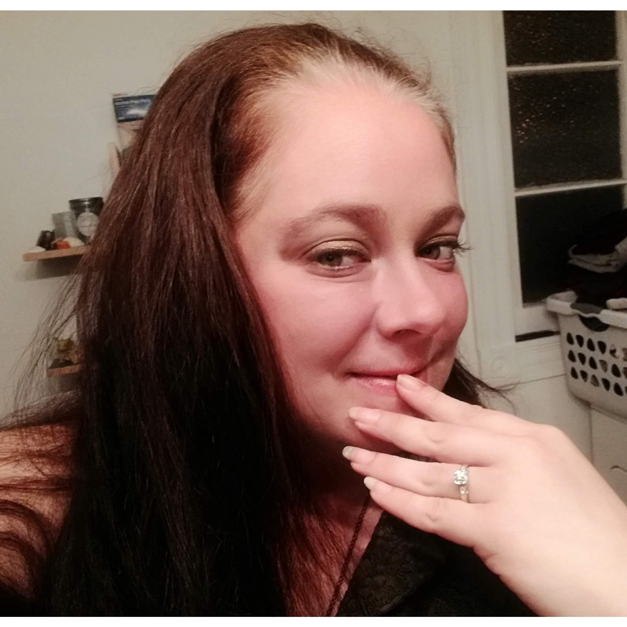 Karen showing off her engagement ring.