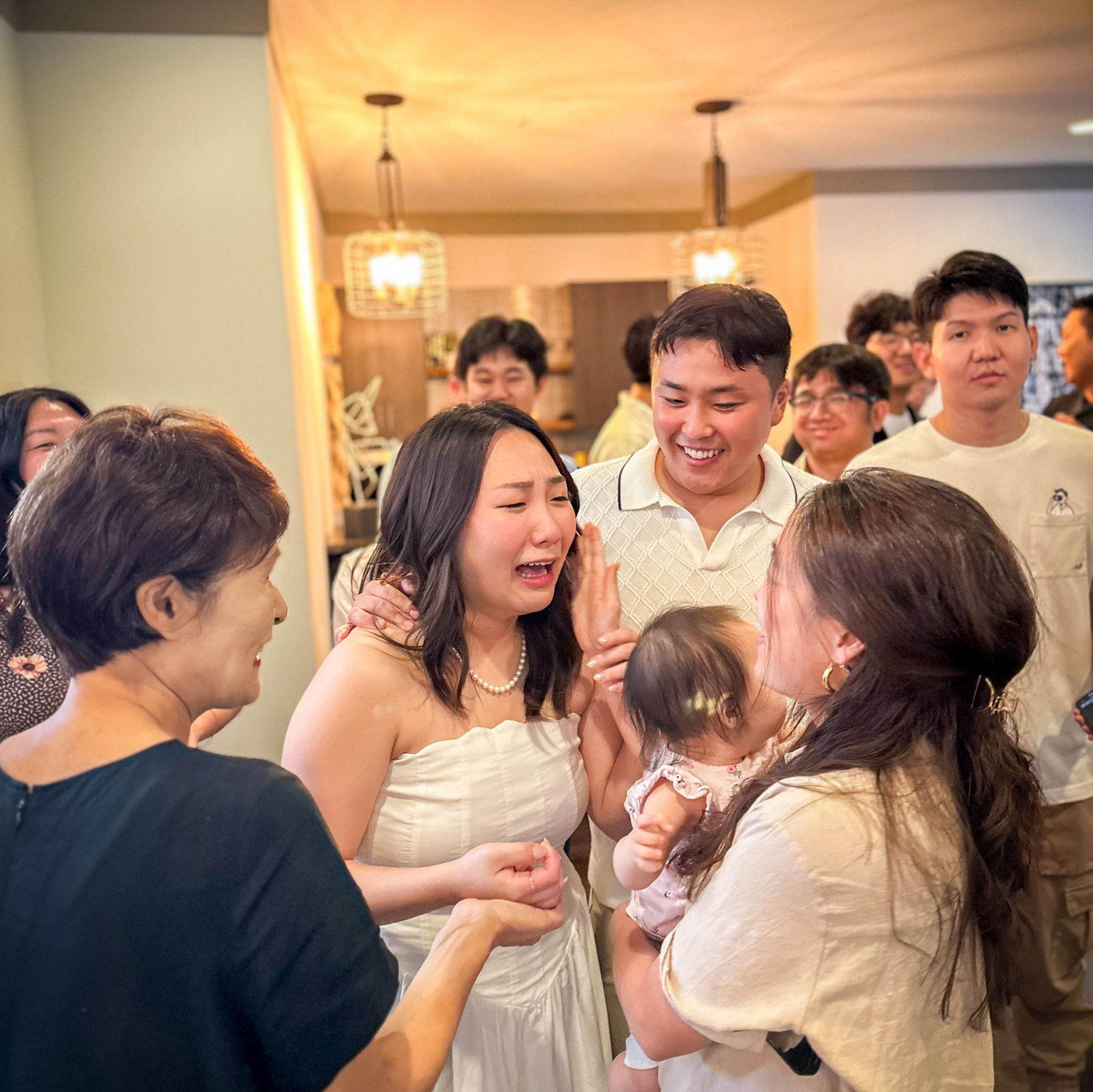 Moments after walking into the arms of family and community after our engagement!