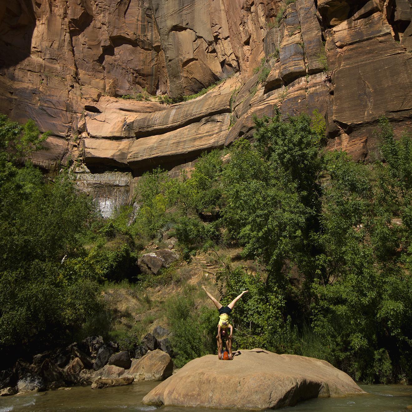 "Star" acro pose in the middle of Virgin River in Zion NP.