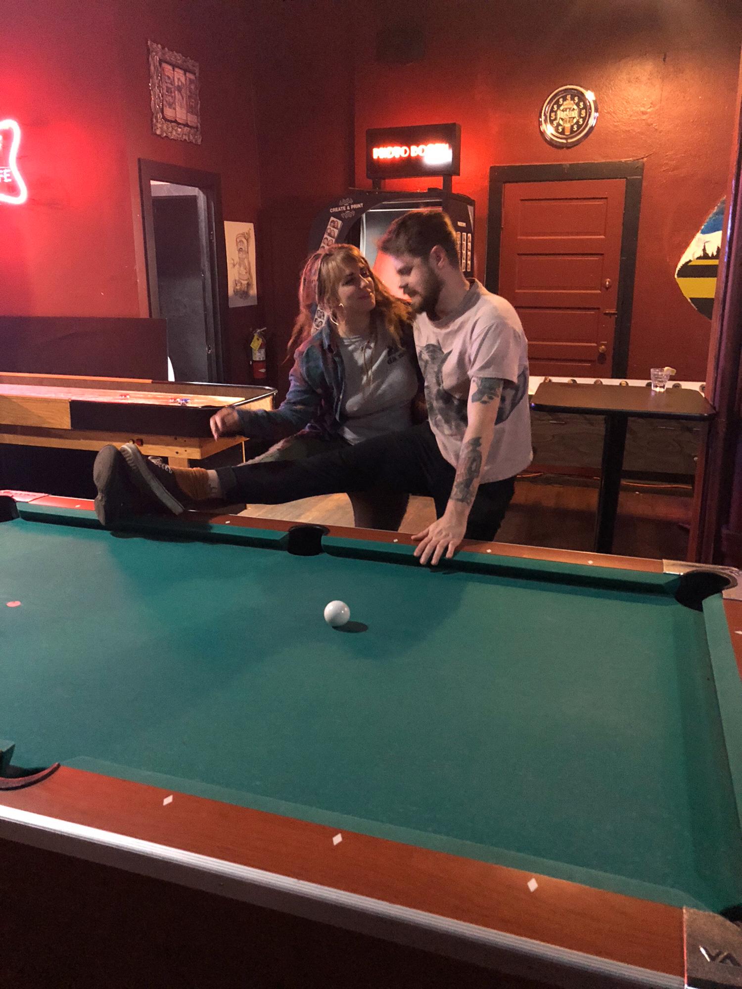 Brandon and Bridesmaid Meghan stretching before the big game.