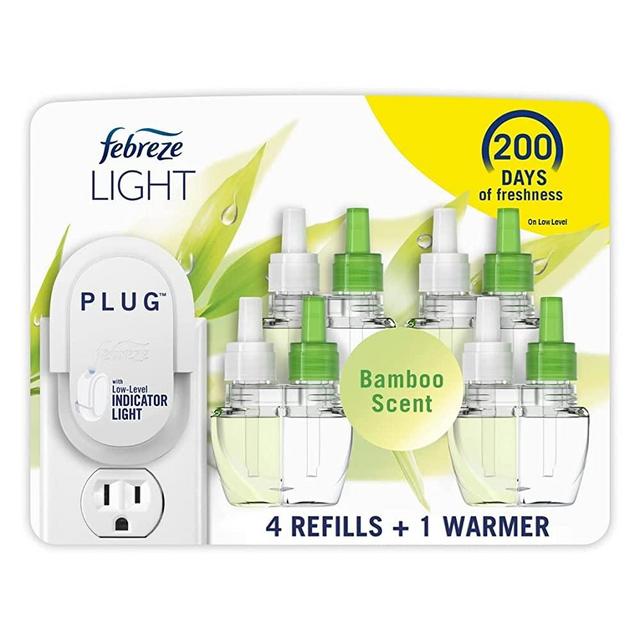 Febreze LIGHT Fade Defy PLUG Air Freshener, Bamboo, Starter Kit & (4) .87 fl. oz. Oil Refills (Packaging may vary)