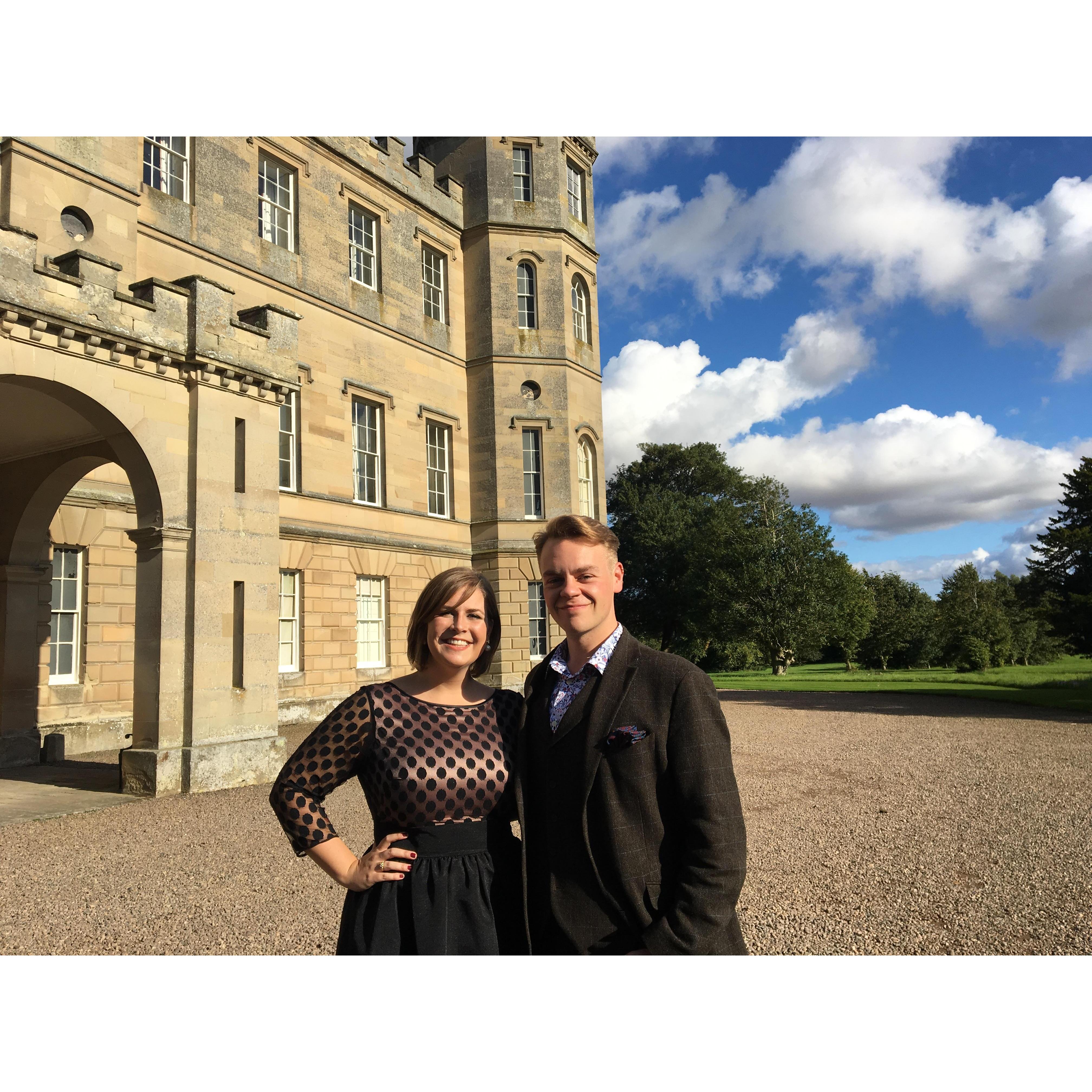 Our first photo together at our friends' wedding in 2017.