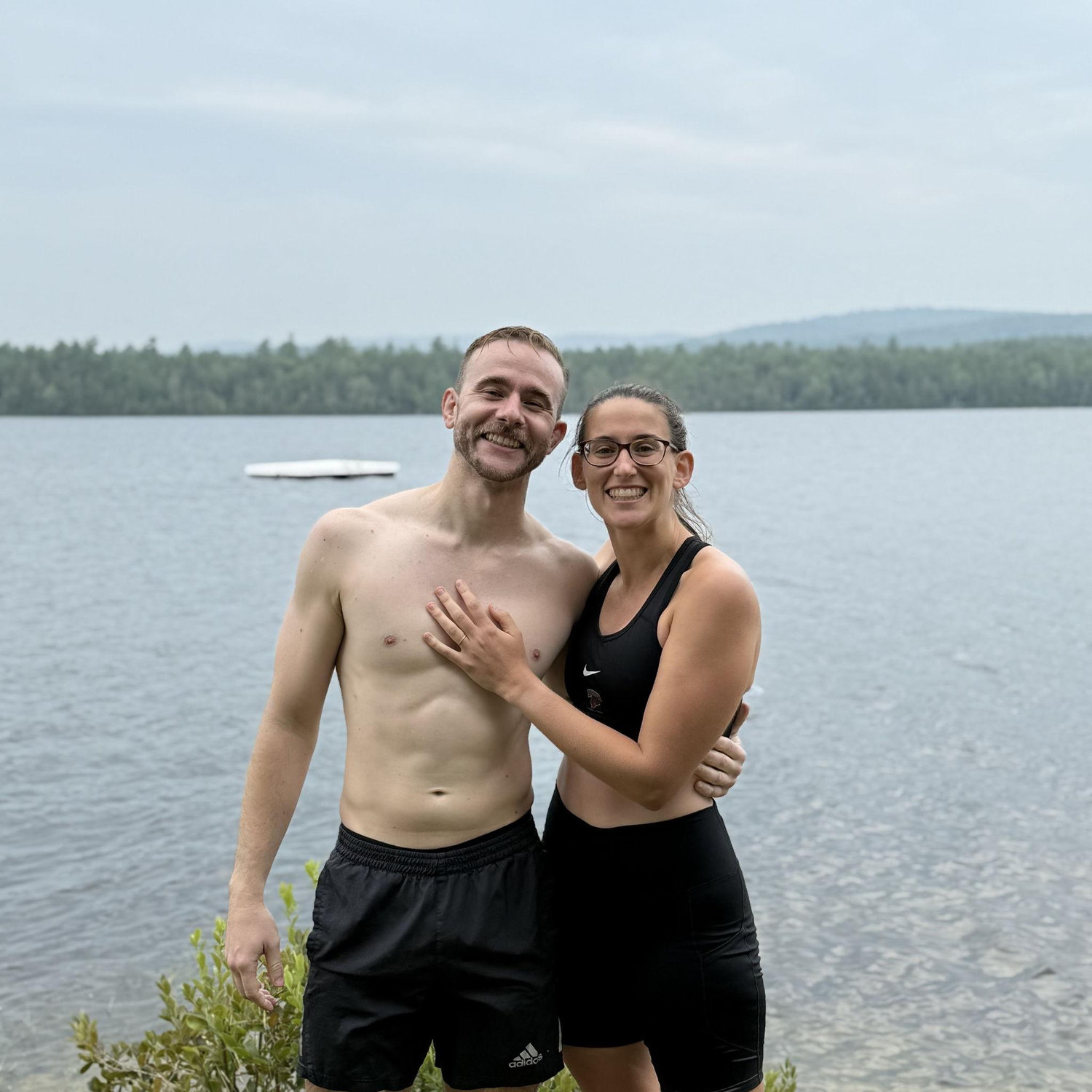Moments after Zach proposed on the floating dock in the background