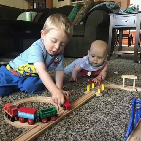July 2019 Cousin LOVE. Ivan showing Wylin how to properly play with trains