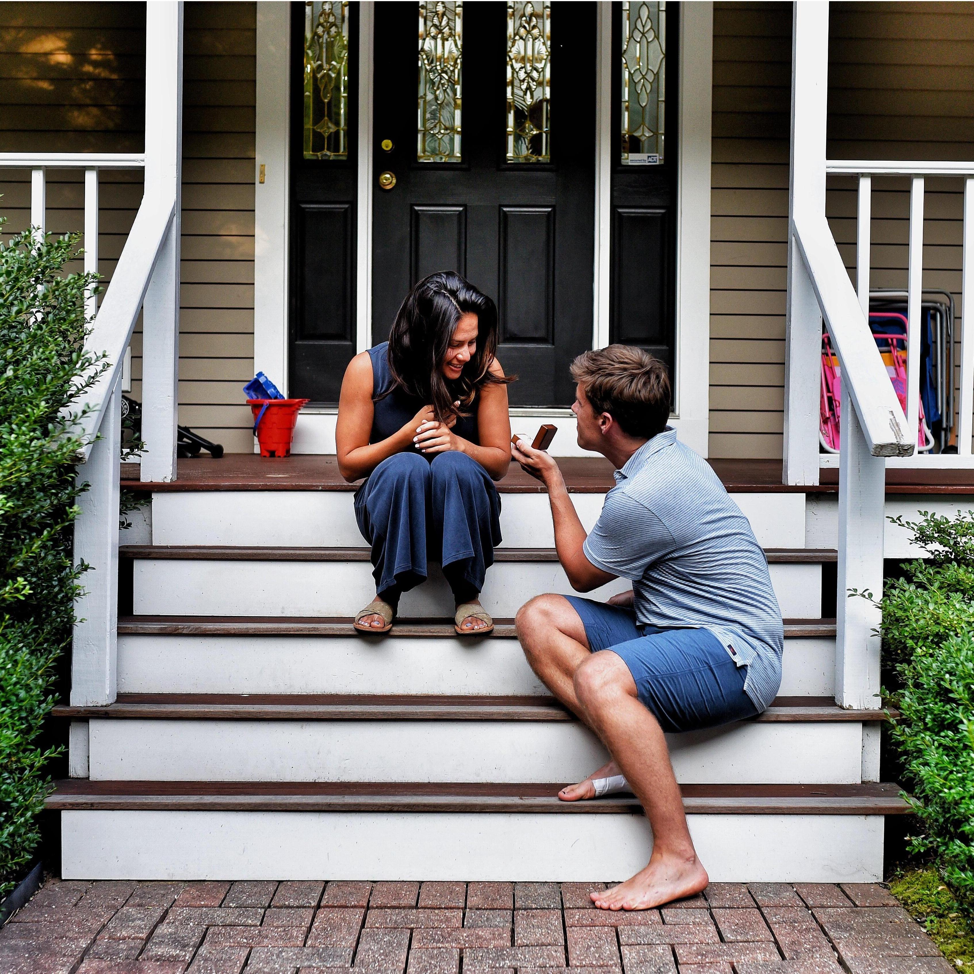 We were engaged August 2019 while on vacation with Kristen's family in Cape Cod. Christian set up his tripod and asked Kristen to take some "test" photos before the family photo shoot at golden hour.