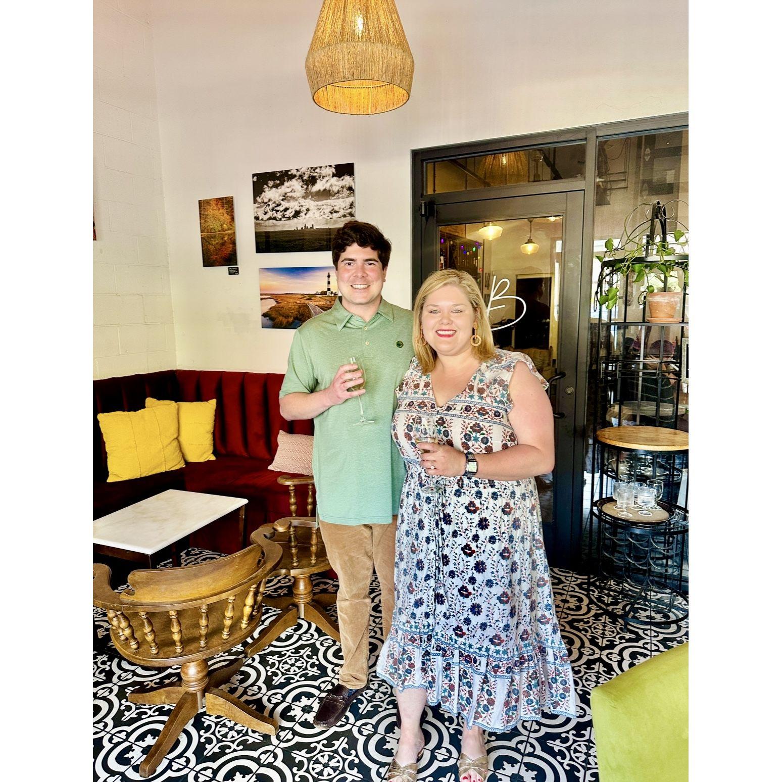 Our engagement at Bohemian Wine Bar in Plaza Midwood. The location of our first date!