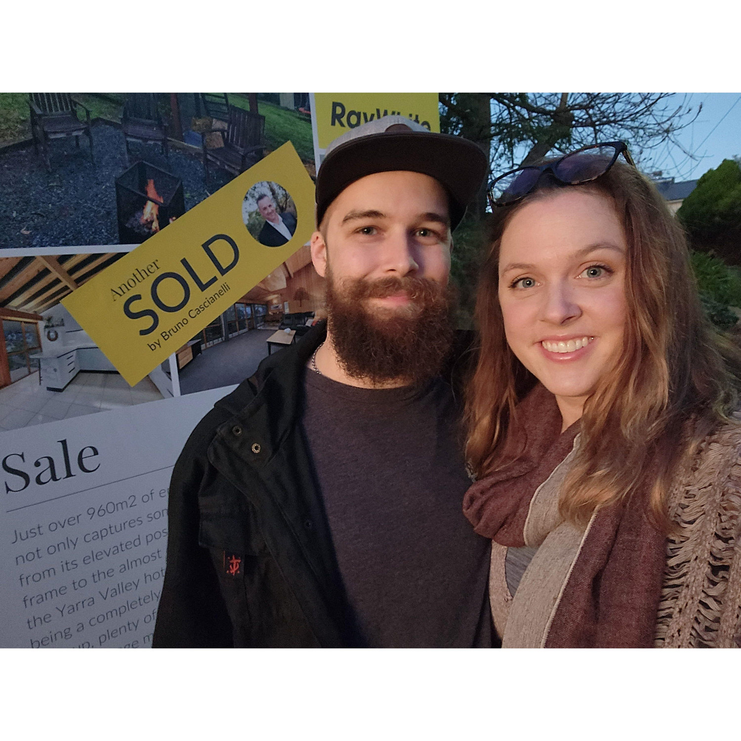 Standing in front of our first home, 2022