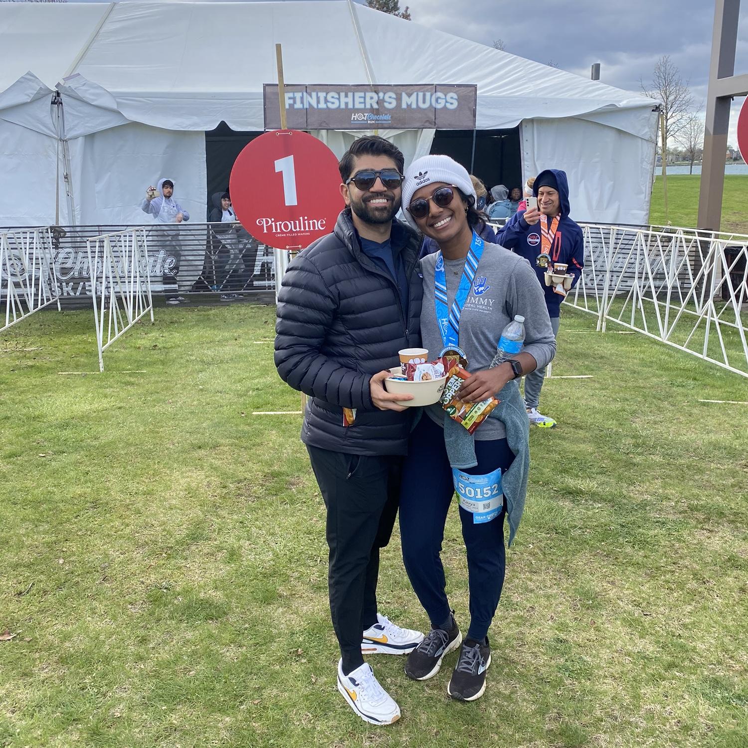 Akbar surprised Kavya by showing up to her 15K race in Detroit (after she dropped many hints)