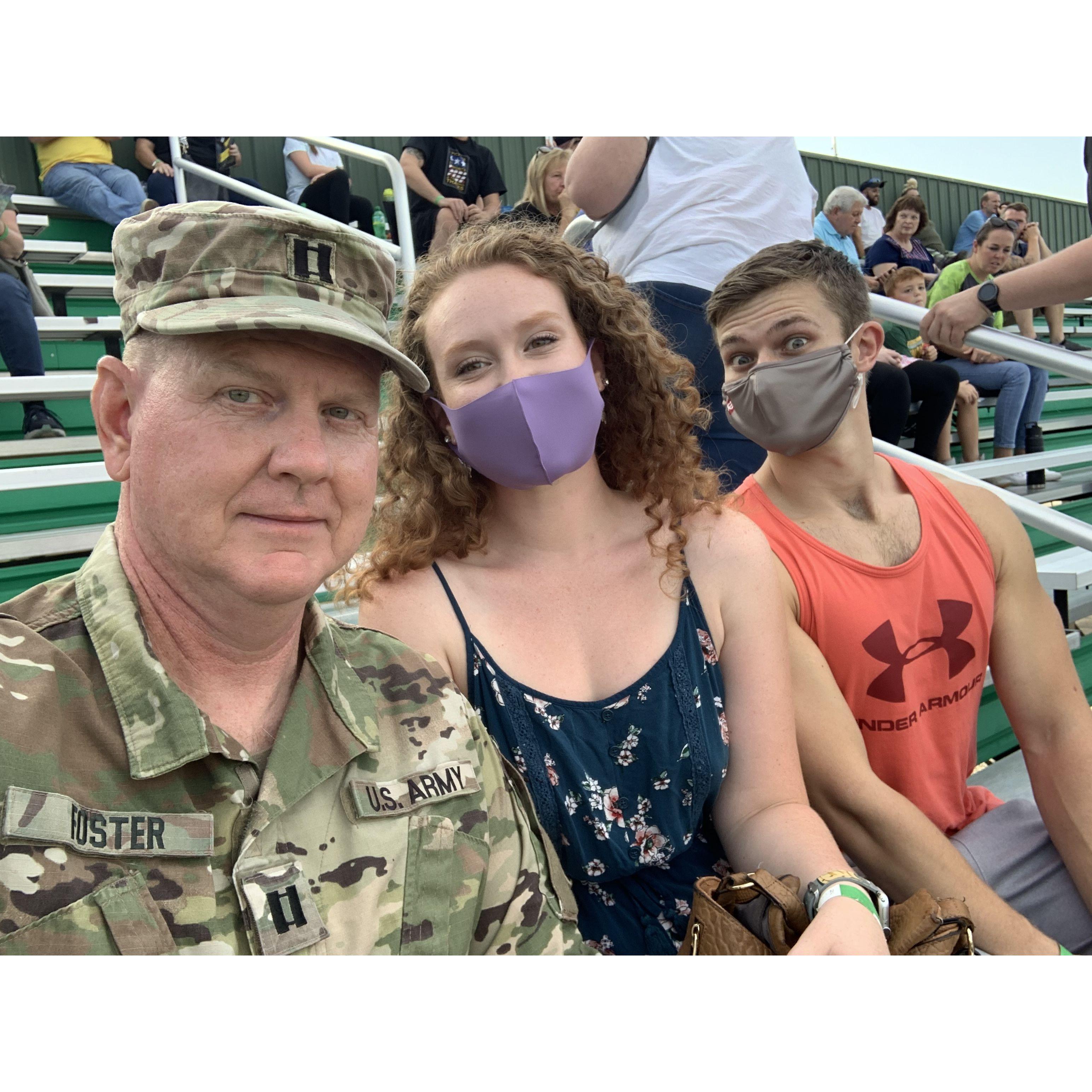 Watching Kyle's marching band with Dad.