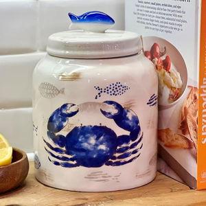 WHW Whole House Worlds Coastal Crabby Cookie Jar, Crab and Fish Motif, Handcrafted, Earthenware, Ivory with Beige and Blue Details, Glazed, Food Safe, 8.5 Inches, Dry Food Storage