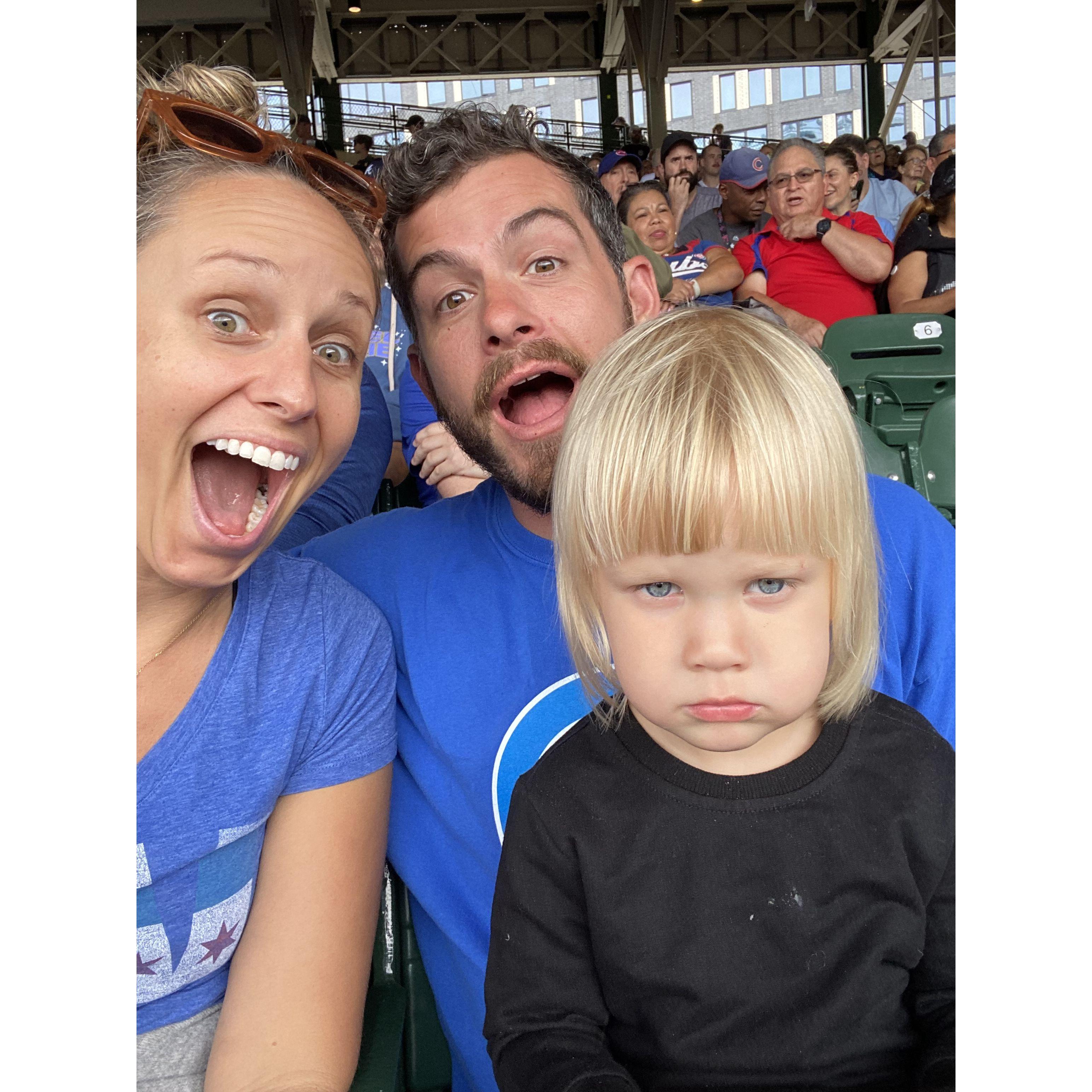 Kyle and I being CUBS FANS for the day. Lily is thrilled