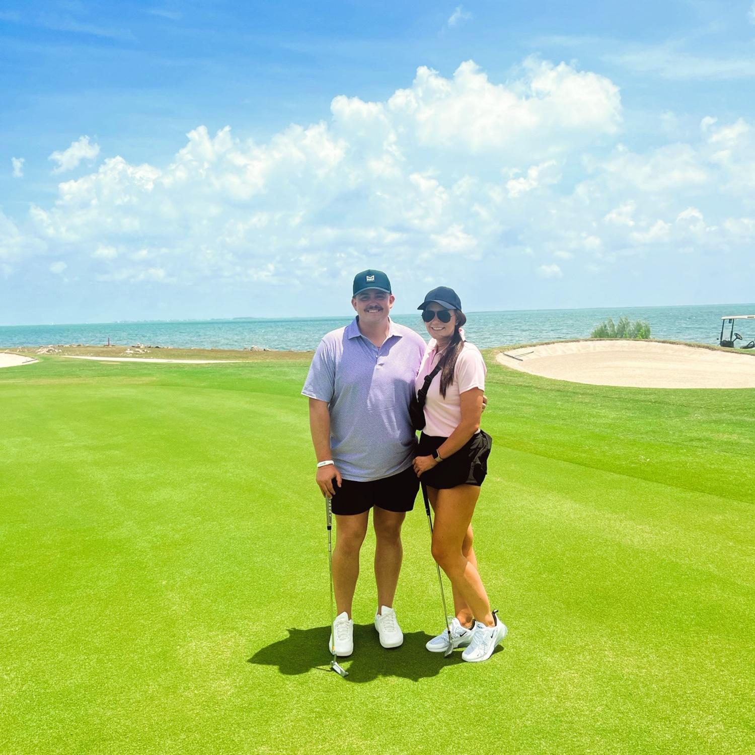 Emma likes to look the part on the golf course, but Chase is the real golfer. He loves when Emma is willing to indulge him in playing a round of golf on vacation! This was taken in the Grand Cayman!