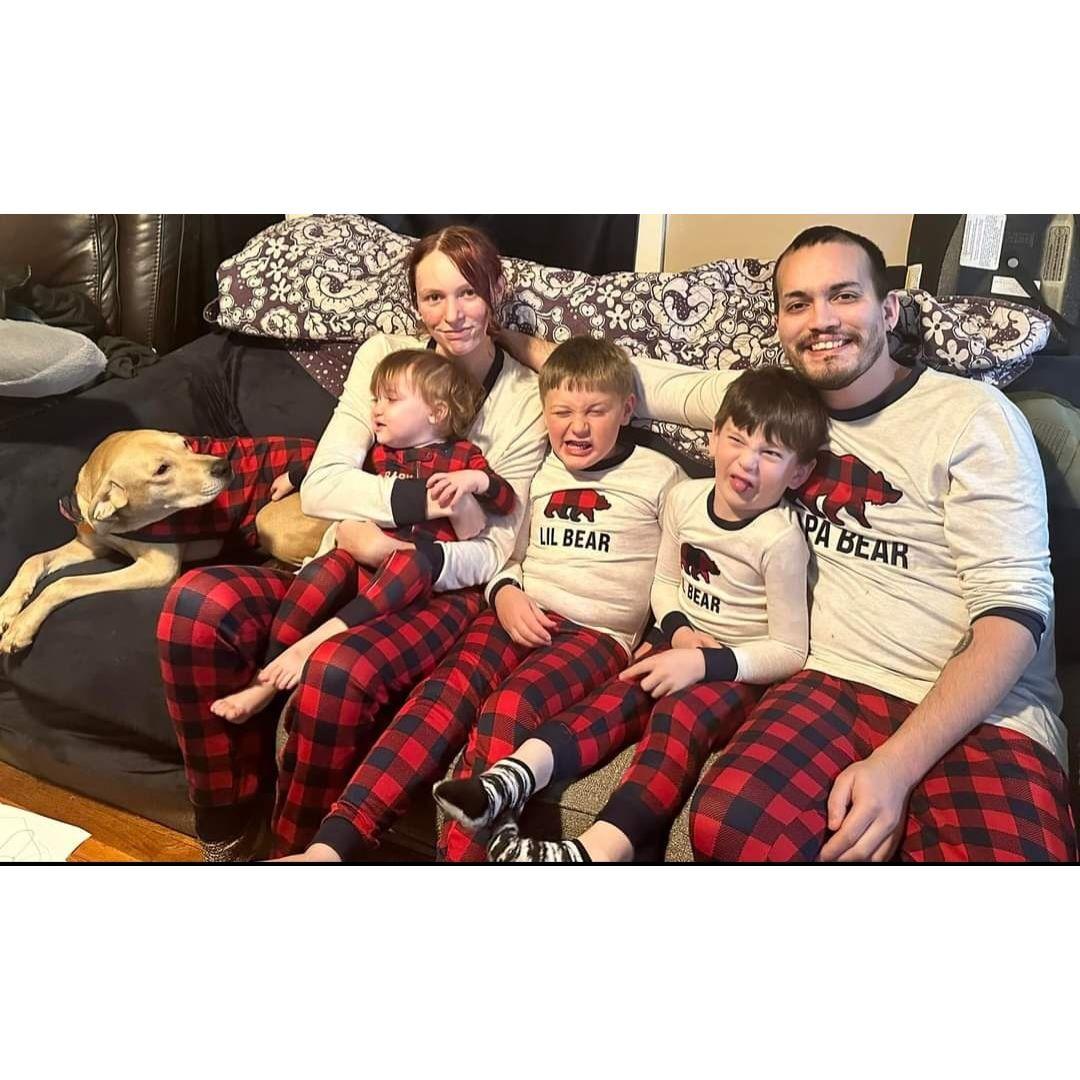 Christmas of 22' our little family before we had our little guy Logan