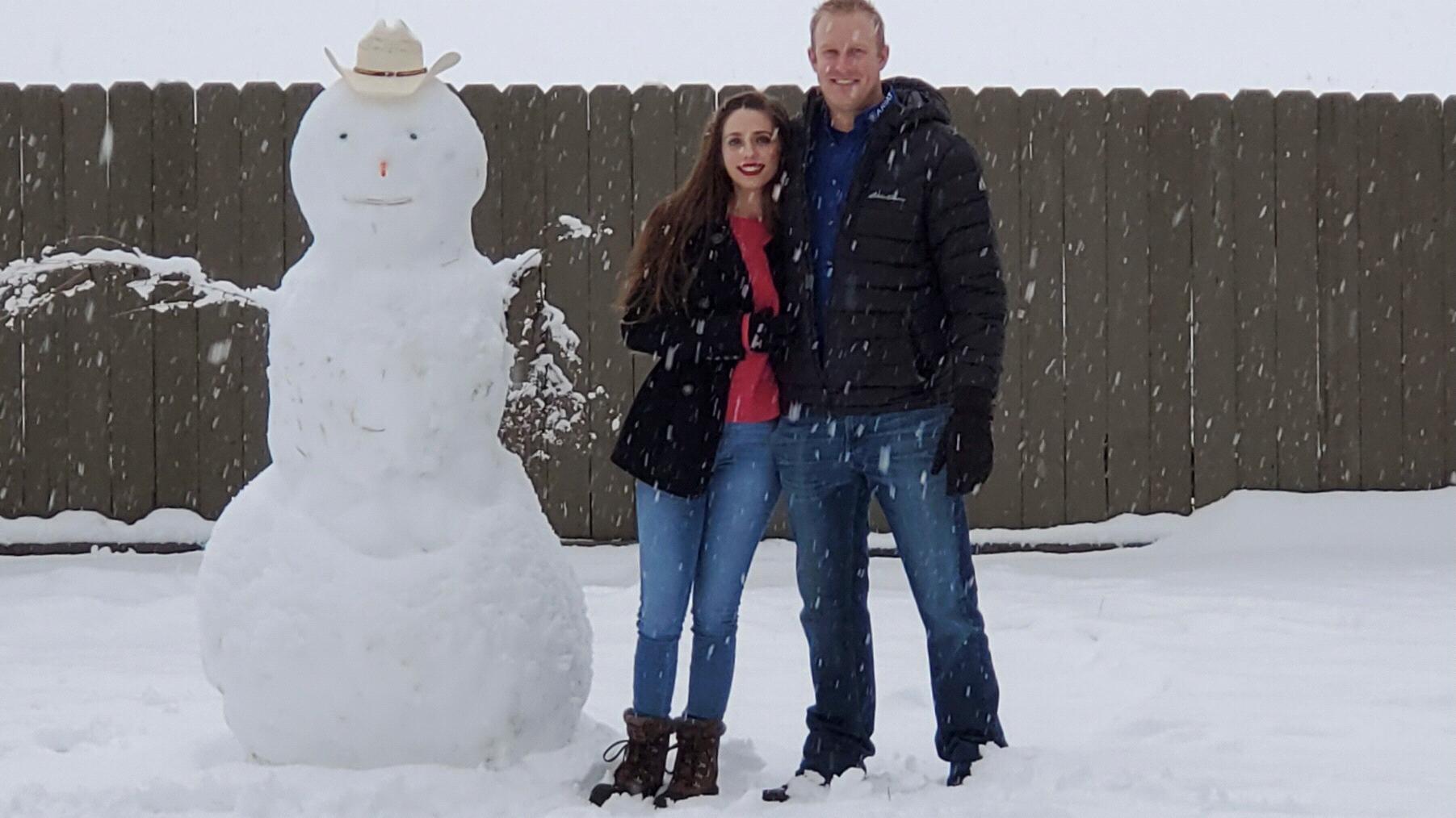 We built a snowman together and gave it a Texas flair!