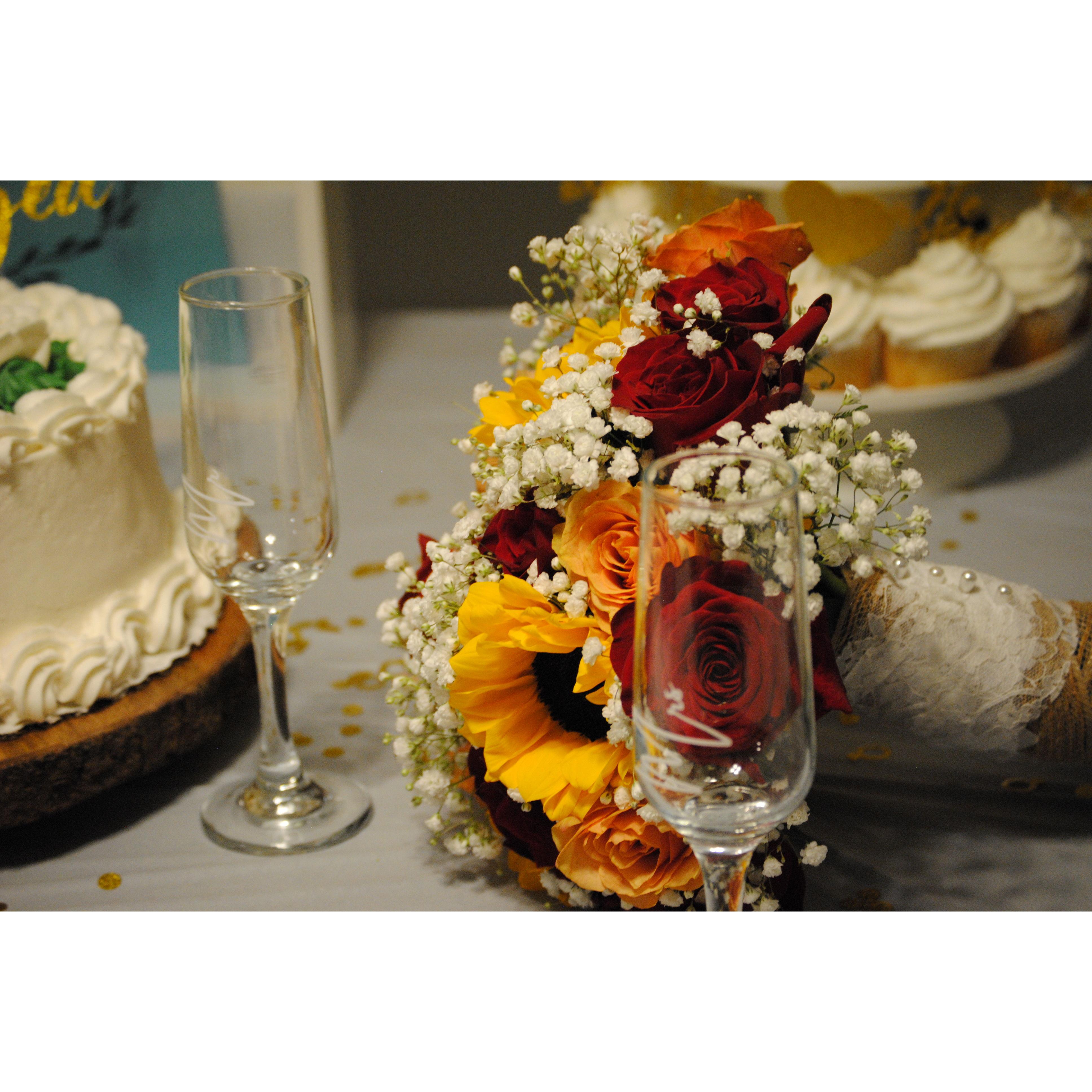 The cake, bouquet and champaigne glasses